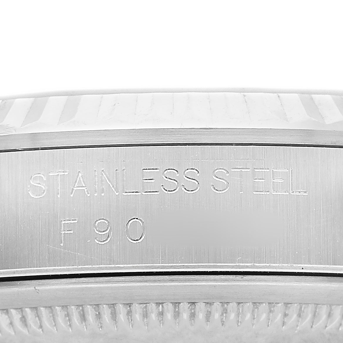 The image shows a close-up of the stainless steel engraved case back of a Rolex Datejust 16234 Men's Stainless Steel Silver Dial watch.