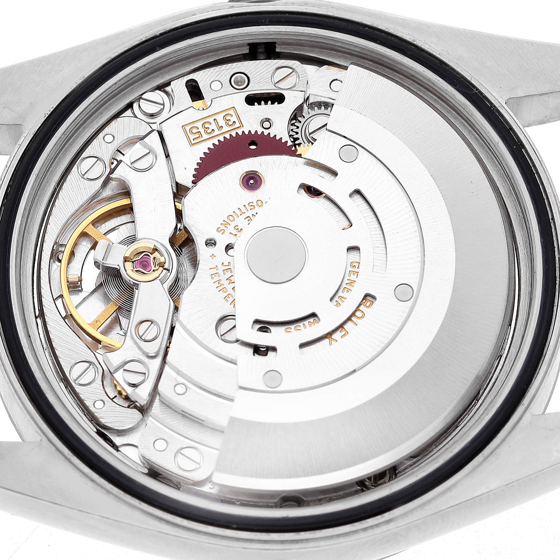 The image shows an inside view of the Rolex Datejust 16234 Men's Stainless Steel Silver Dial movement, highlighting its intricate mechanical components.