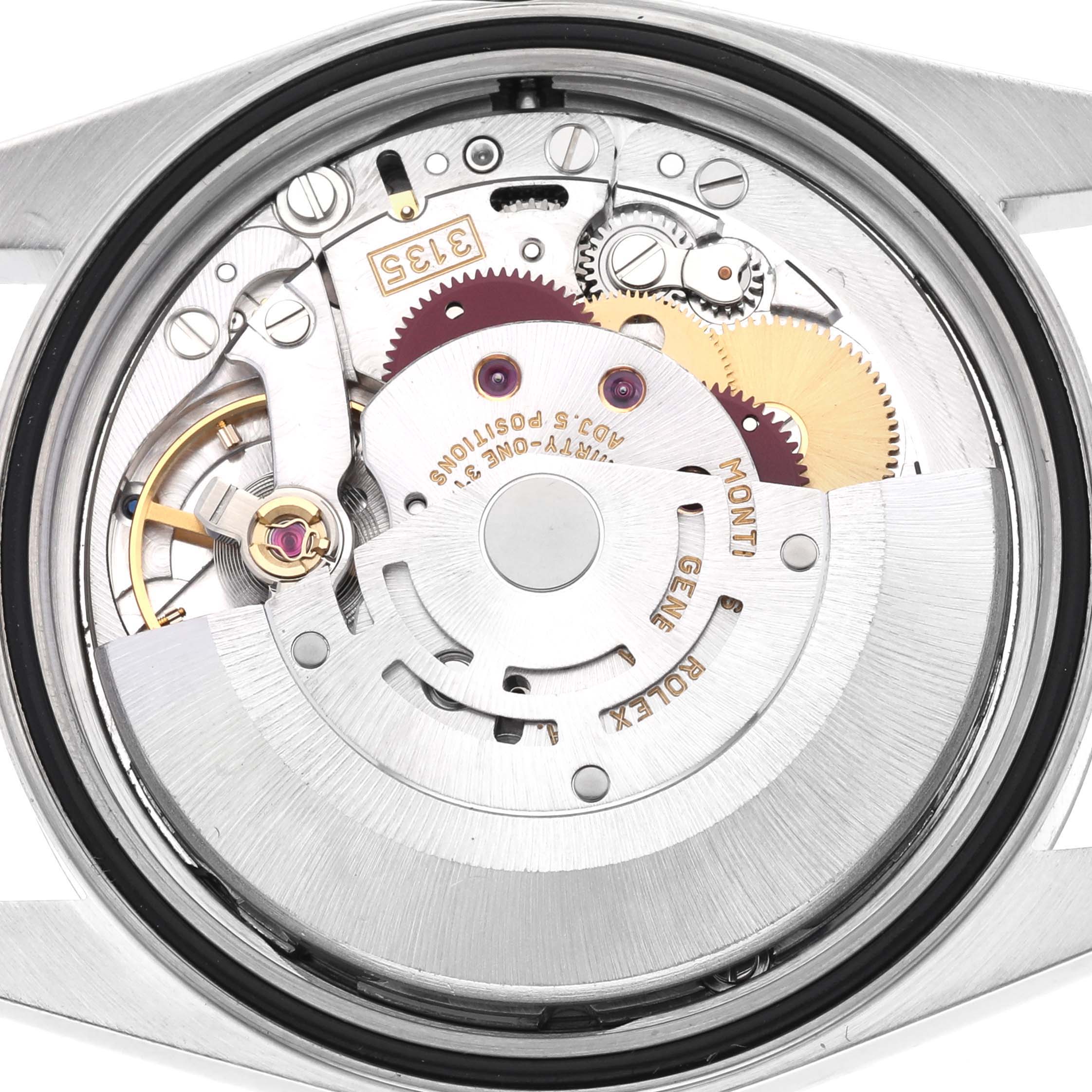 The image shows the movement of a Rolex Datejust 16234 Men
s Steel and Gold (two tone) Silver Dial 16234 Men
s Steel and Gold (two tone) Silver Dial watch from the back, highlighting gears and components.
