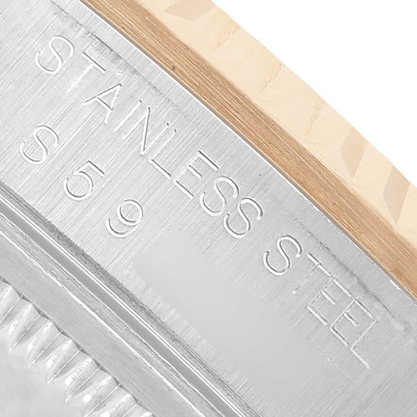 The image shows a close-up of the side of the Rolex Datejust 16233 Men's Stainless Steel Black Dial, highlighting the edge with "STAINLESS STEEL" engraving.