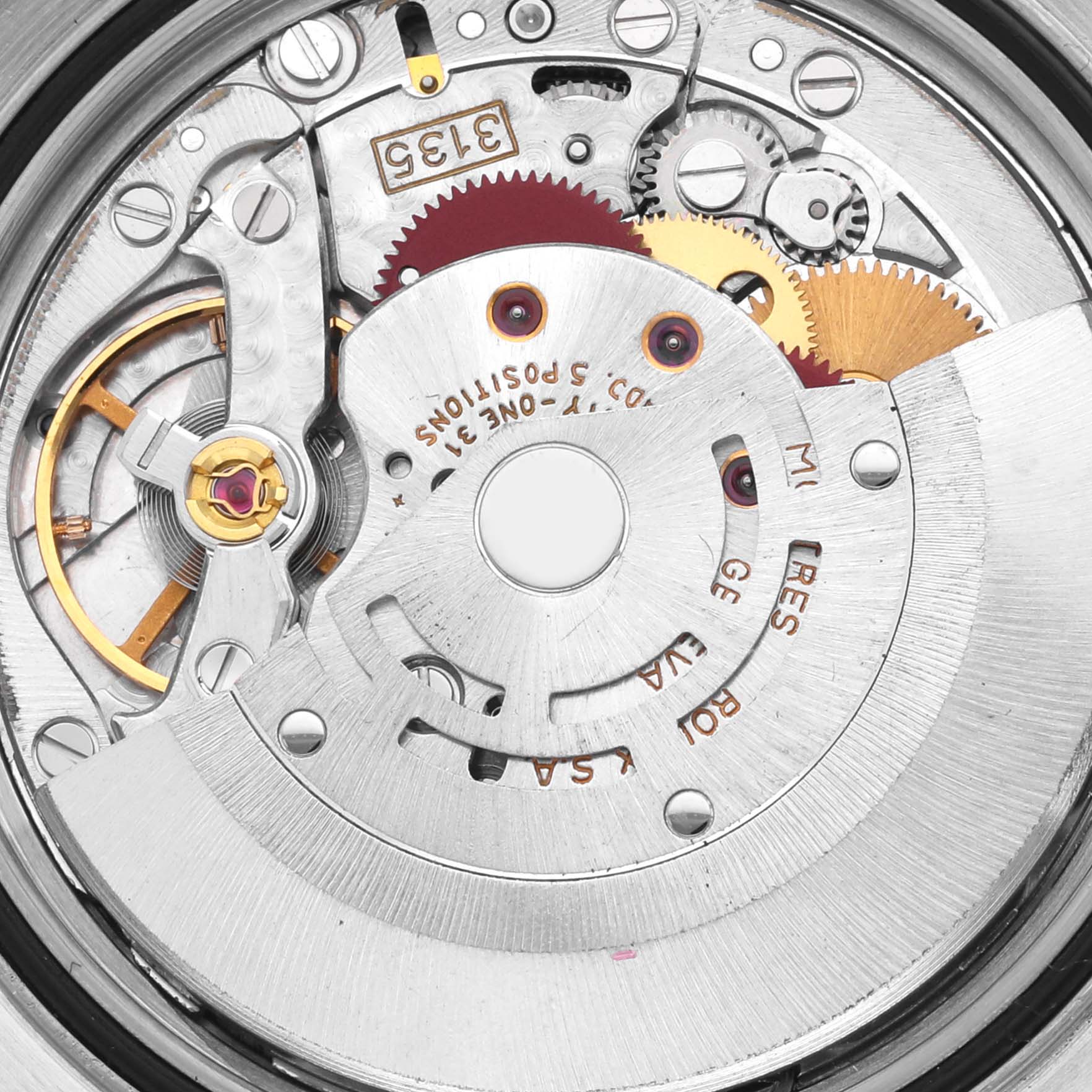 The image shows the mechanical movement of a Rolex Datejust 16233 Men
s Steel and Gold (two tone) Silver Dial 16233 Men
s Steel and Gold (two tone) Silver Dial, showcasing gears and components from a top-down angle.