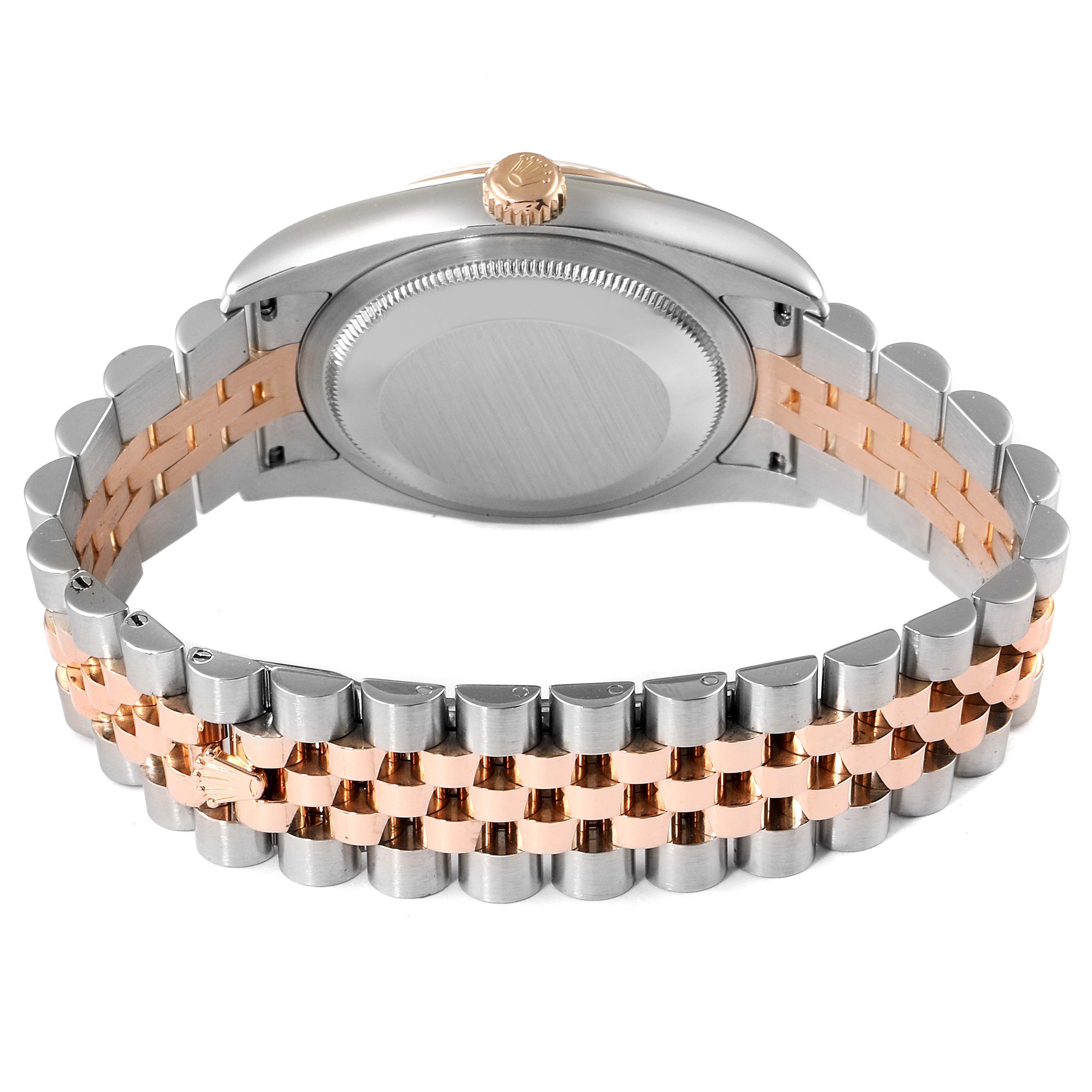 The image shows the back view and bezel of the Rolex Datejust 116231 Men's Steel and Gold (two tone) Pink Dial 116231 Men's Steel and Gold (two tone) Pink Dial watch, highlighting its two-tone bracelet in silver and rose gold.