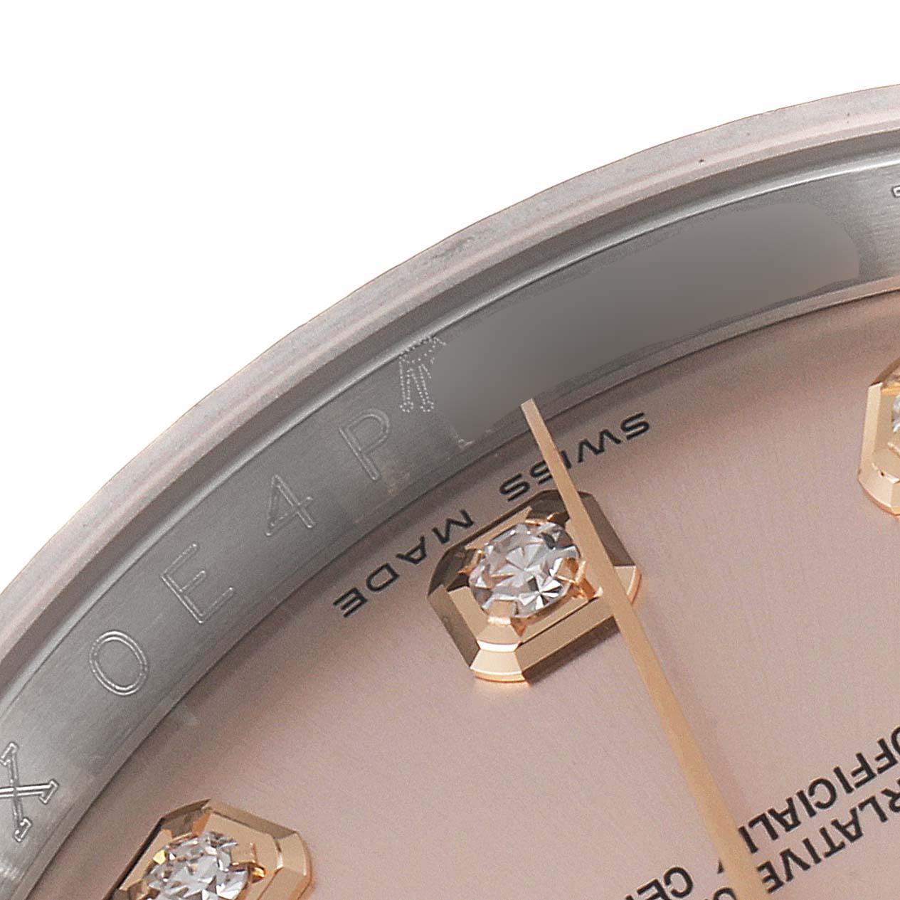 The image shows a close-up of the dial and part of the bezel of a Rolex Datejust 116231 Men's Steel and Gold (two tone) Pink Dial 116231 Men's Steel and Gold (two tone) Pink Dial watch, highlighting diamond hour markers.