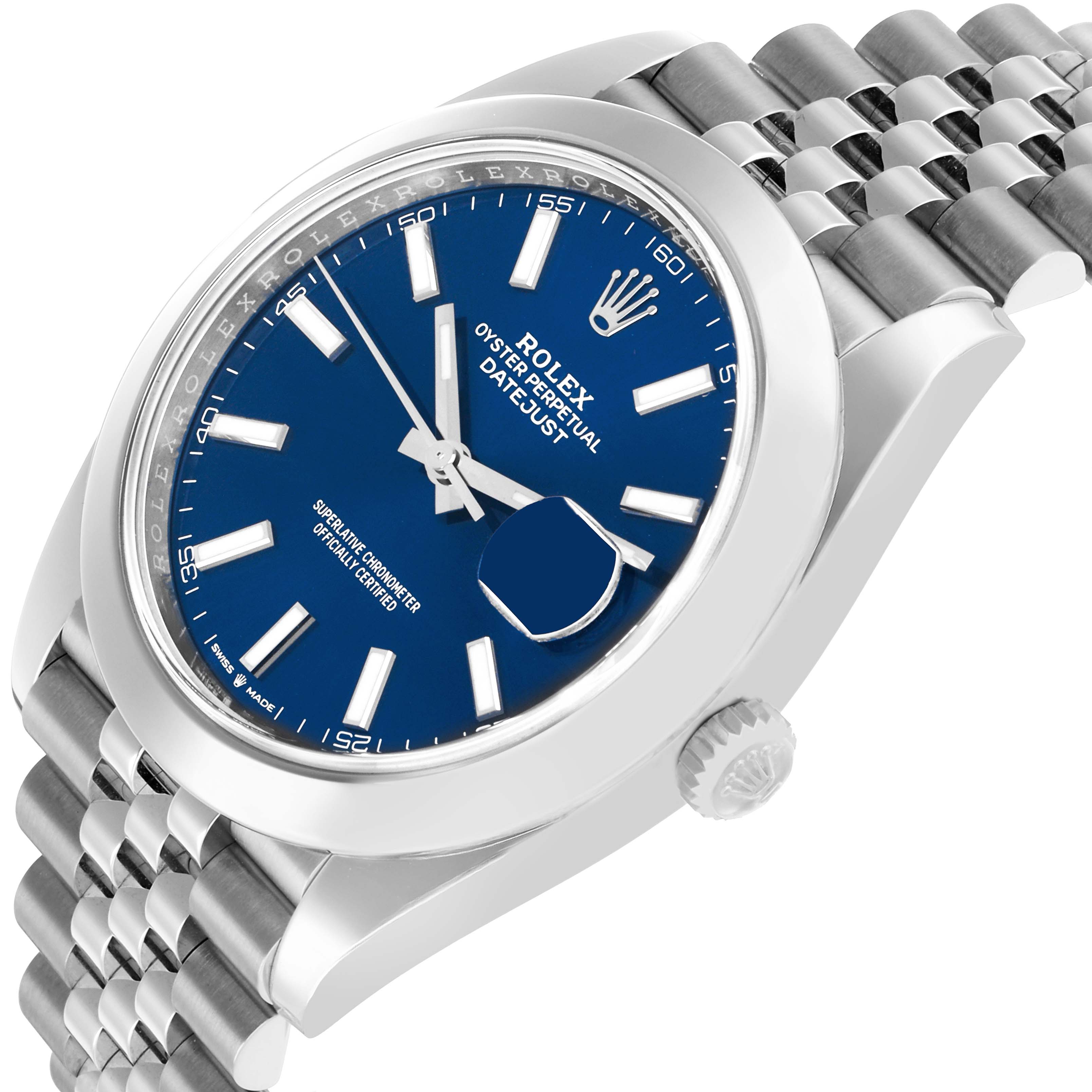 The Rolex Datejust 41 126300 Men
s Stainless Steel Blue Dial is shown from a side angle, highlighting the blue dial, hour markers, Jubilee bracelet, crown, and date magnifier.