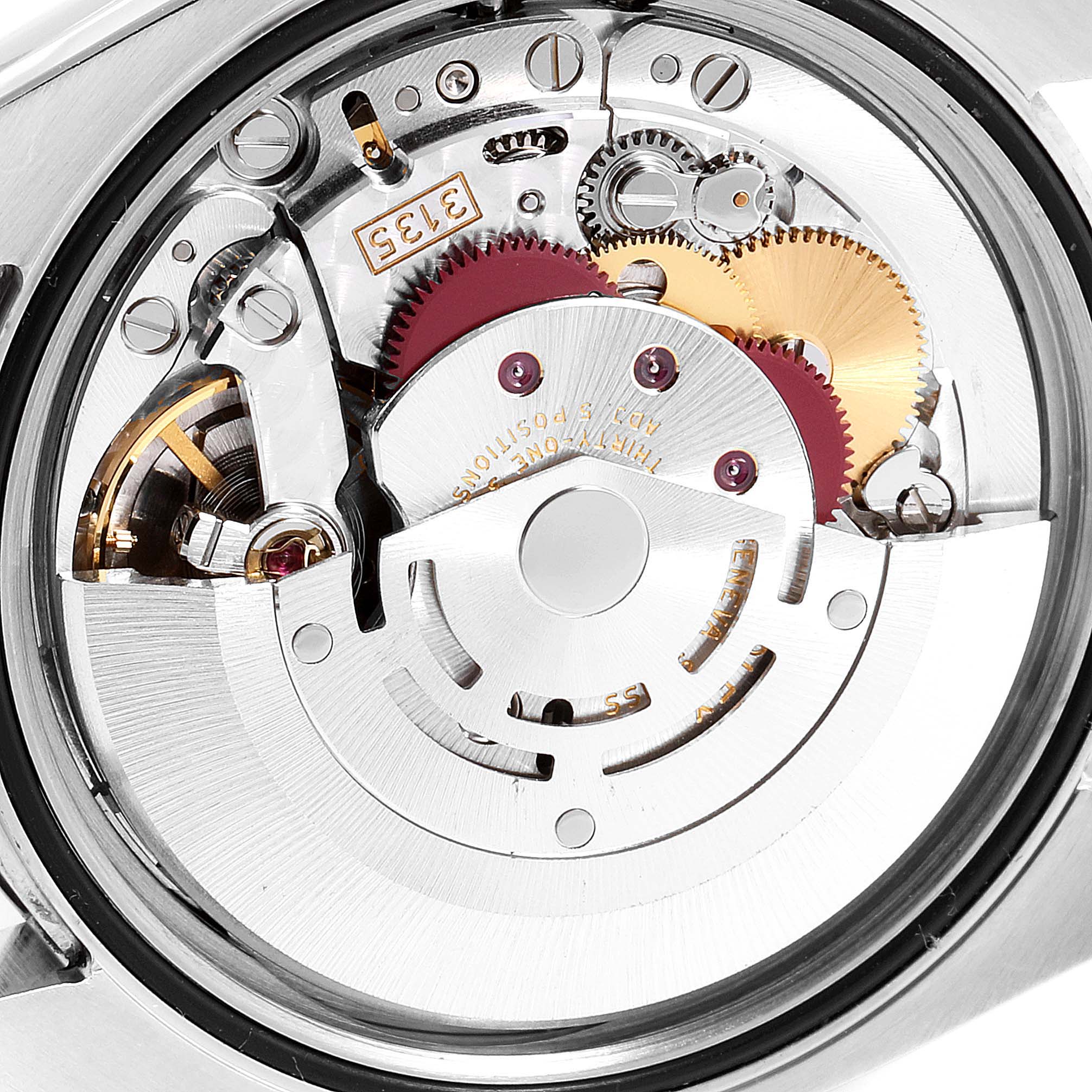 This image shows the internal mechanism of a Rolex Datejust 116200 Men's Stainless Steel Black Dial 116200 Men's Stainless Steel Black Dial watch, focusing on the movement and gears.