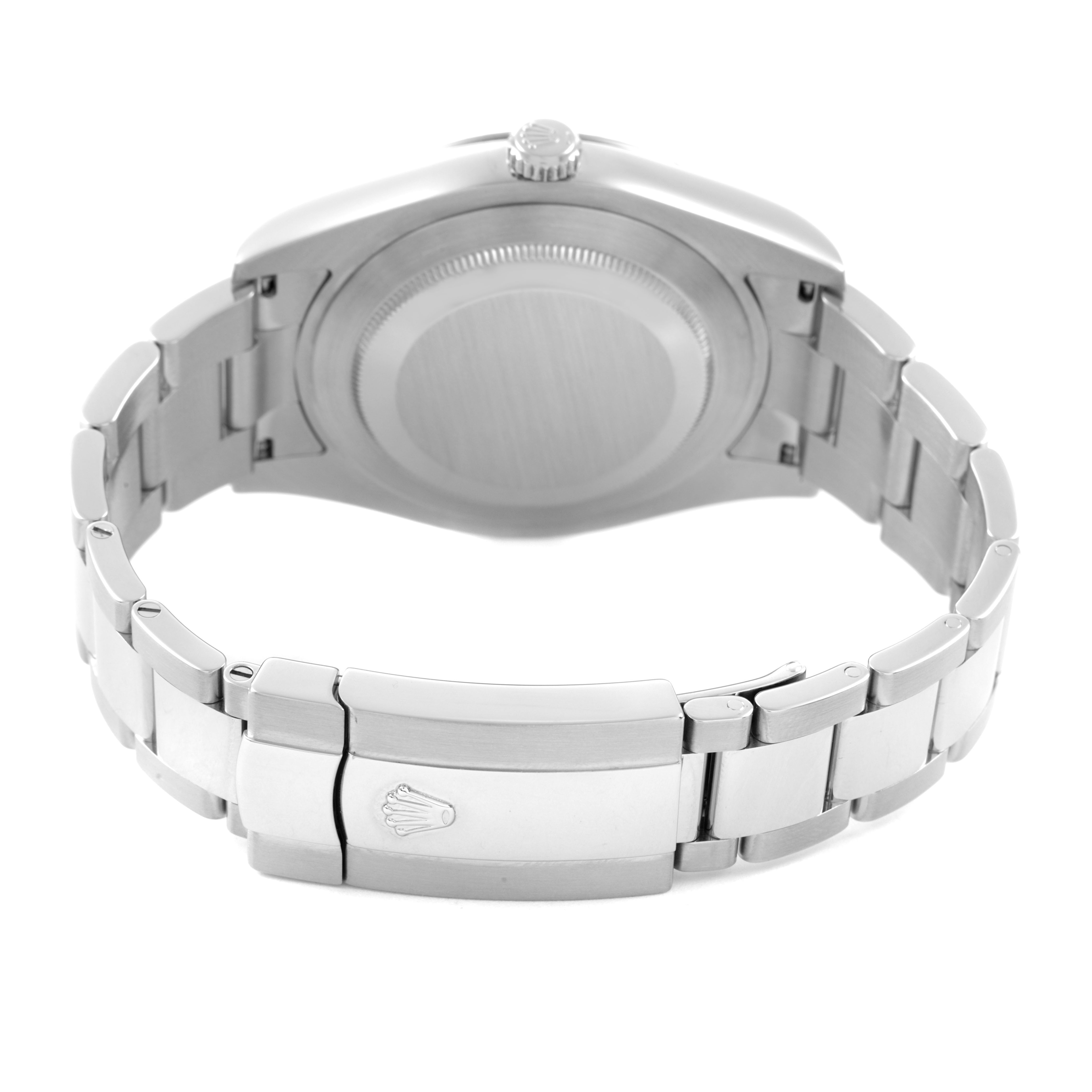 The Rolex Datejust 41 116334 Men's Stainless Steel White Dial is shown from the back, highlighting the case, crown, and clasp with the Rolex logo on the bracelet.