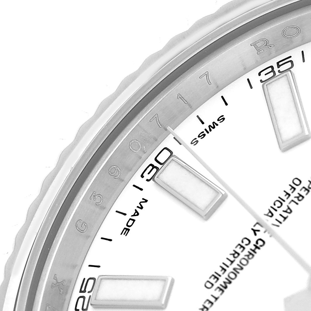 The image shows a close-up of the bezel and dial of the Rolex Datejust 41 116334 Men's Stainless Steel White Dial, highlighting the indices and part of the chapter ring.