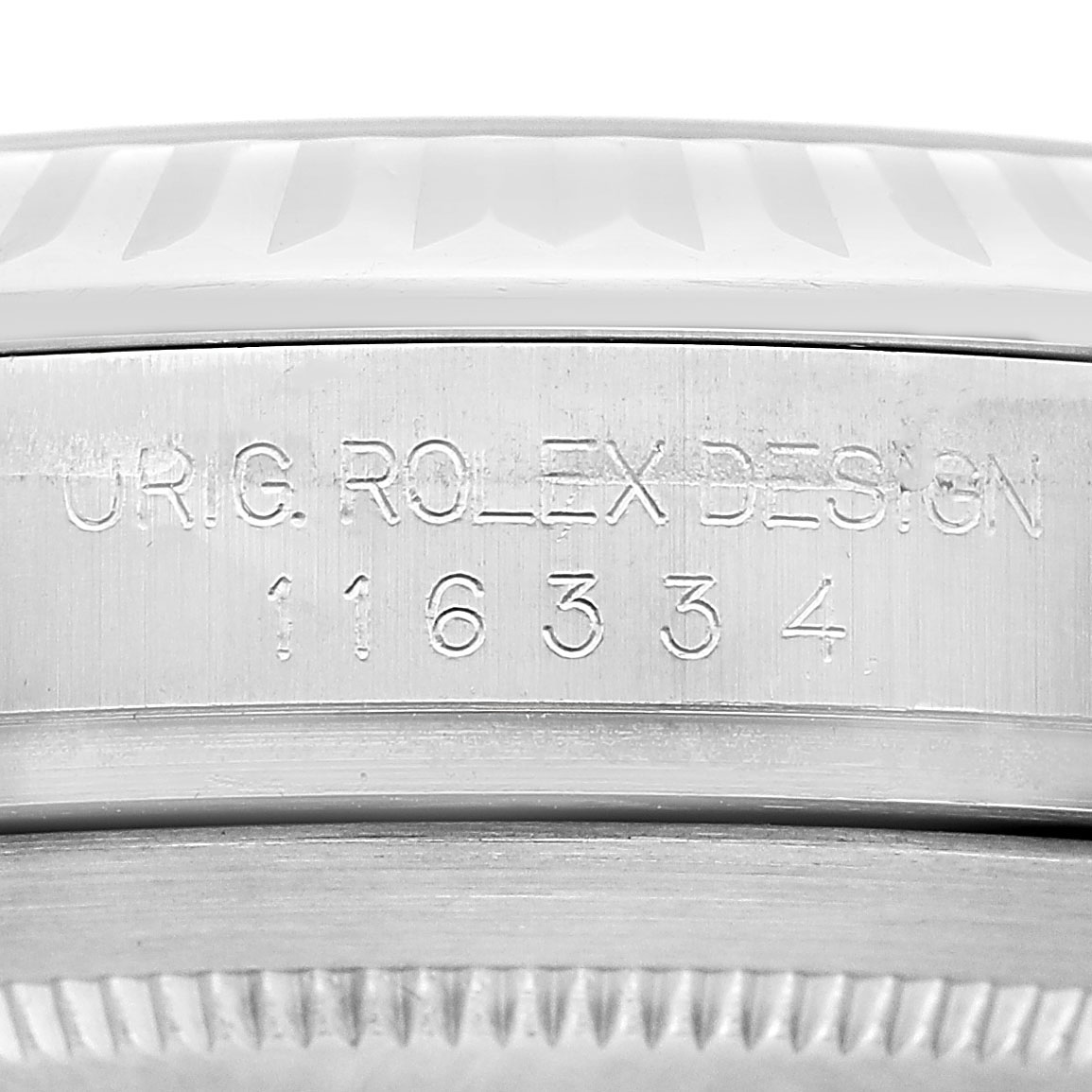 The image shows a close-up of the case side of a Rolex Datejust 41 116334 Men's Stainless Steel White Dial, highlighting the engraved model number.