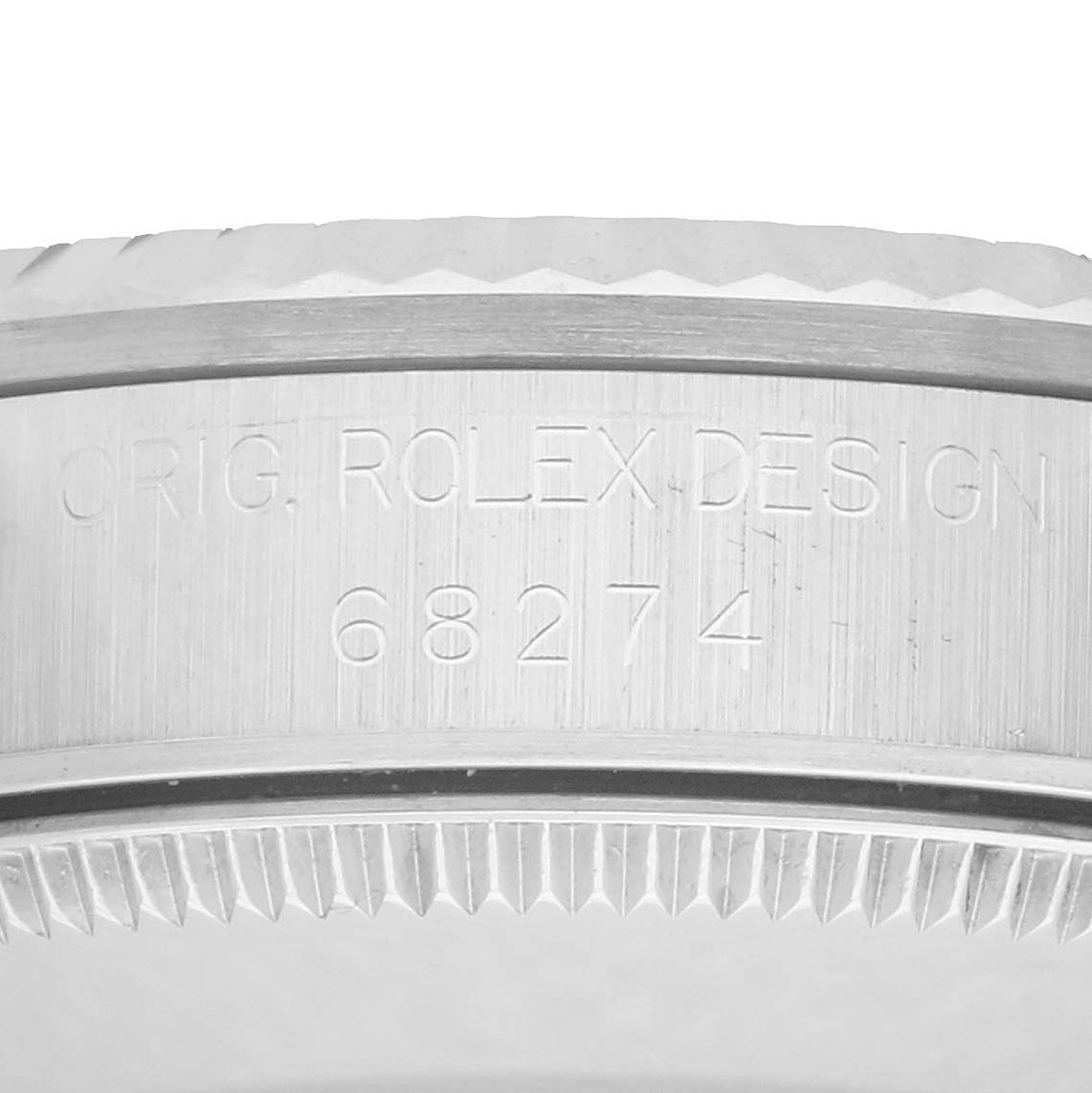 The image shows the side view of a Rolex Mid-Size 68274 Women's Stainless Steel Pink Dial model with visible engravings and the watch bezel.