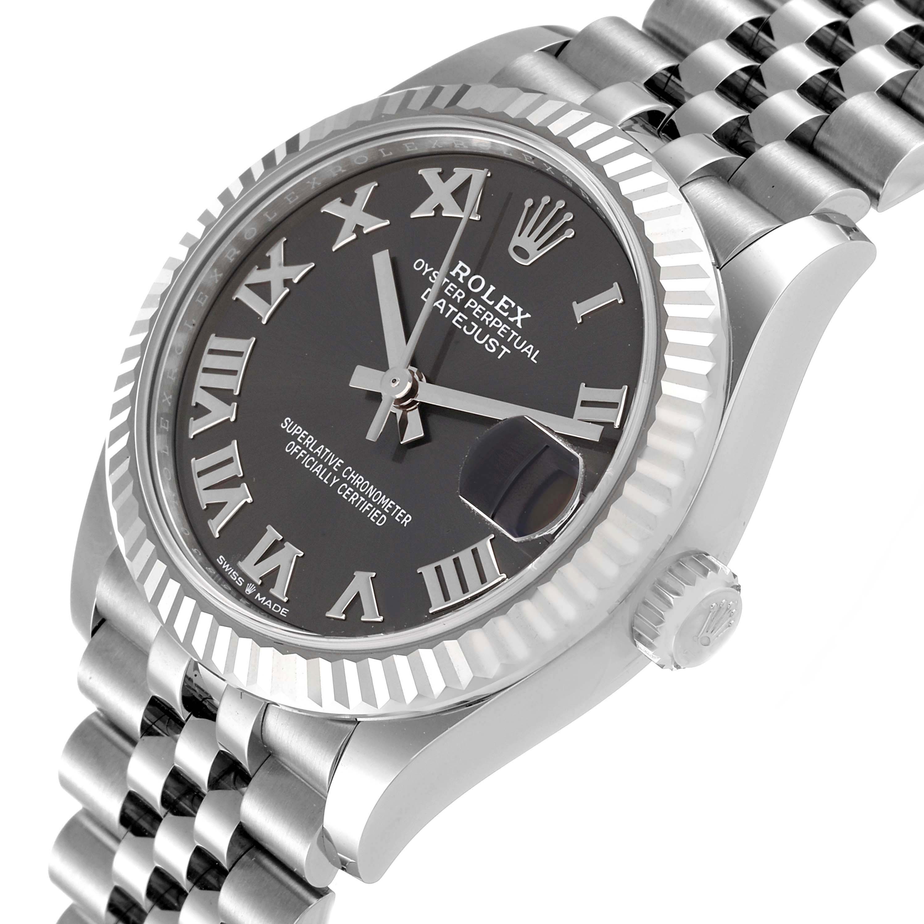 This image shows a mid-size Rolex Datejust watch at an angle highlighting its face, bezel, crown, and part of the bracelet.