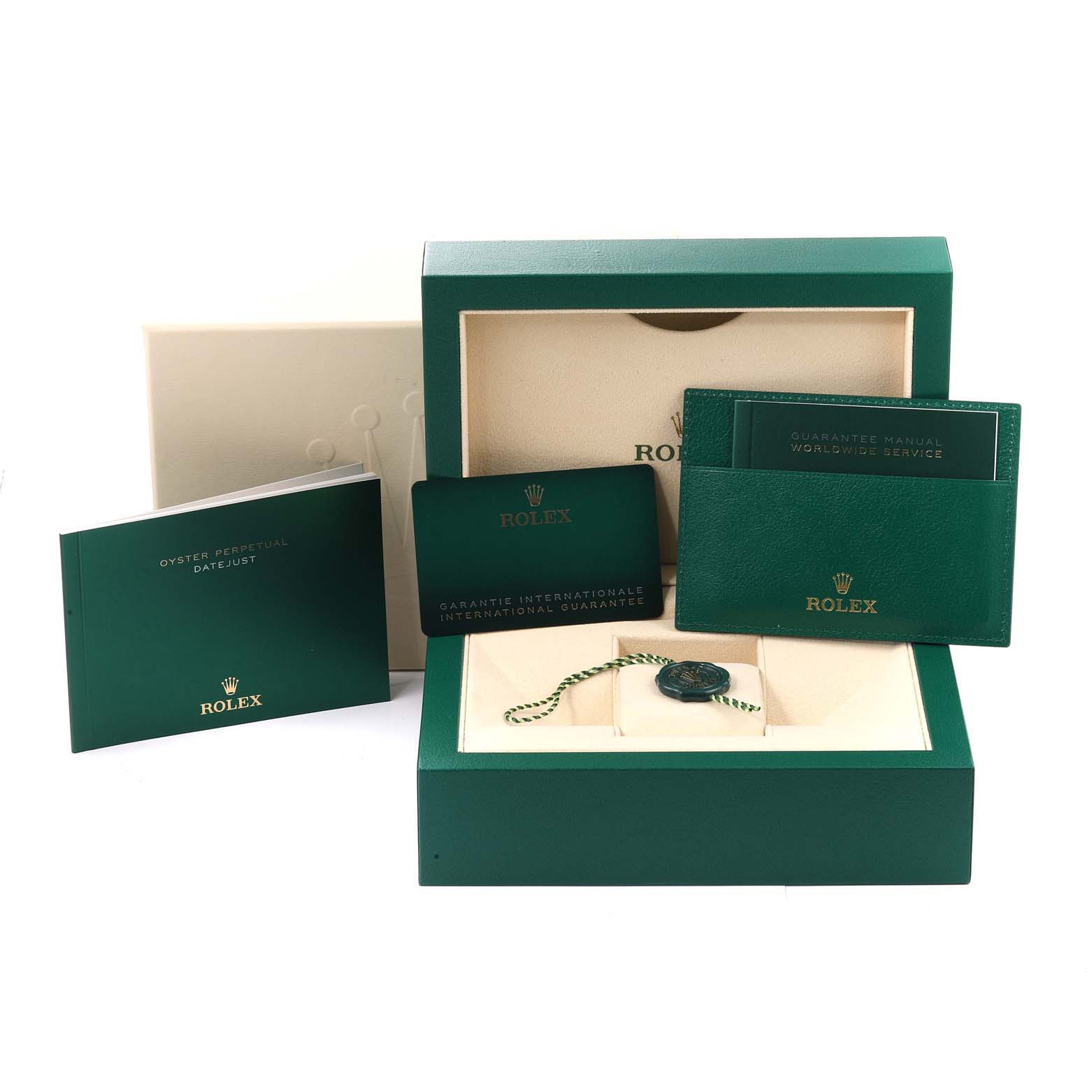 This image shows the accessories for a Mid-Size Rolex watch, including manuals, warranty card, box, and hang tag.