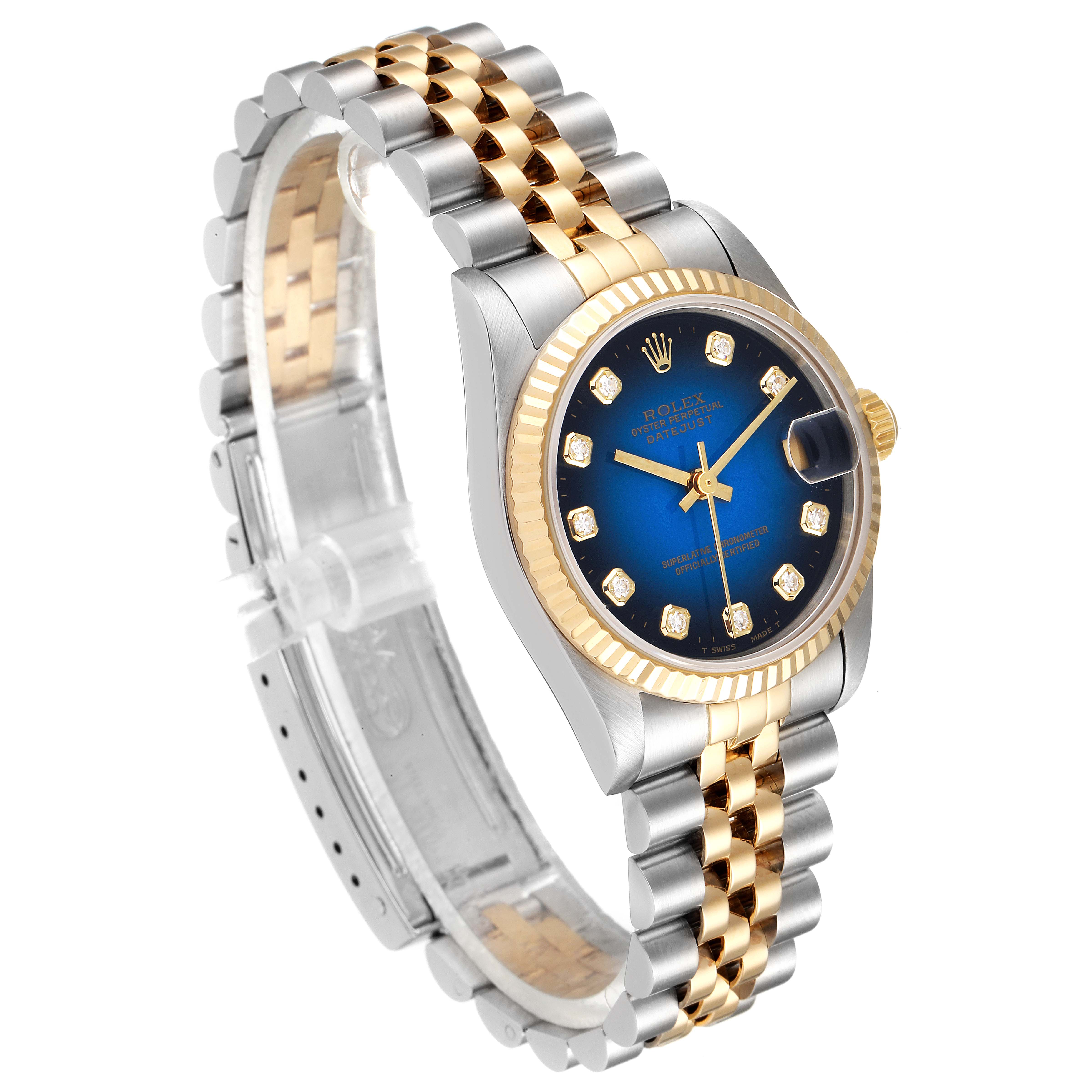 This angle showcases the face, bezel, and bracelet of the Mid-Size Rolex watch.