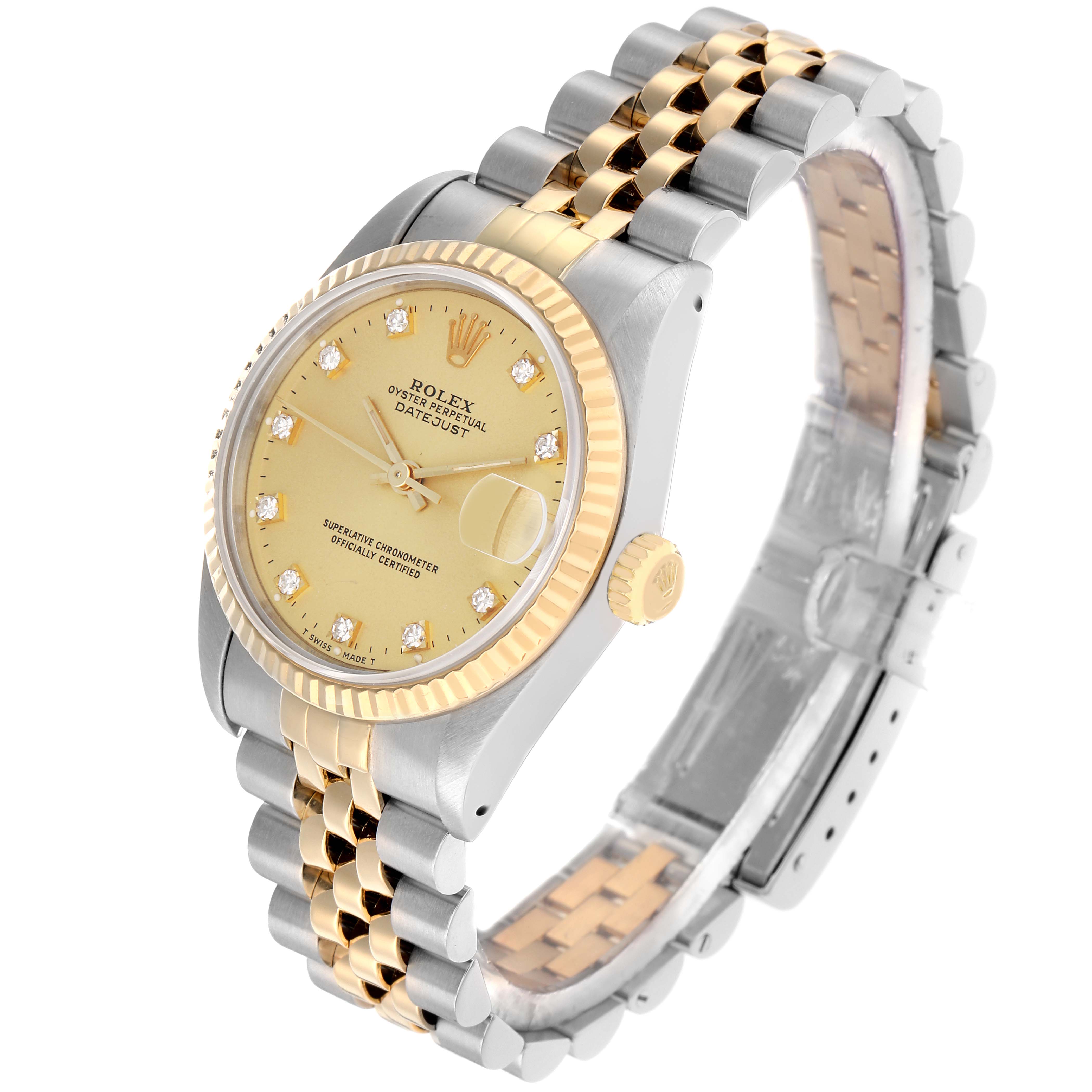 The Rolex Mid-Size 68273 Women's Steel and Gold (two tone) Champagne Dial watch is shown at a three-quarter angle, displaying the gold bezel, champagne dial, and two-tone bracelet.