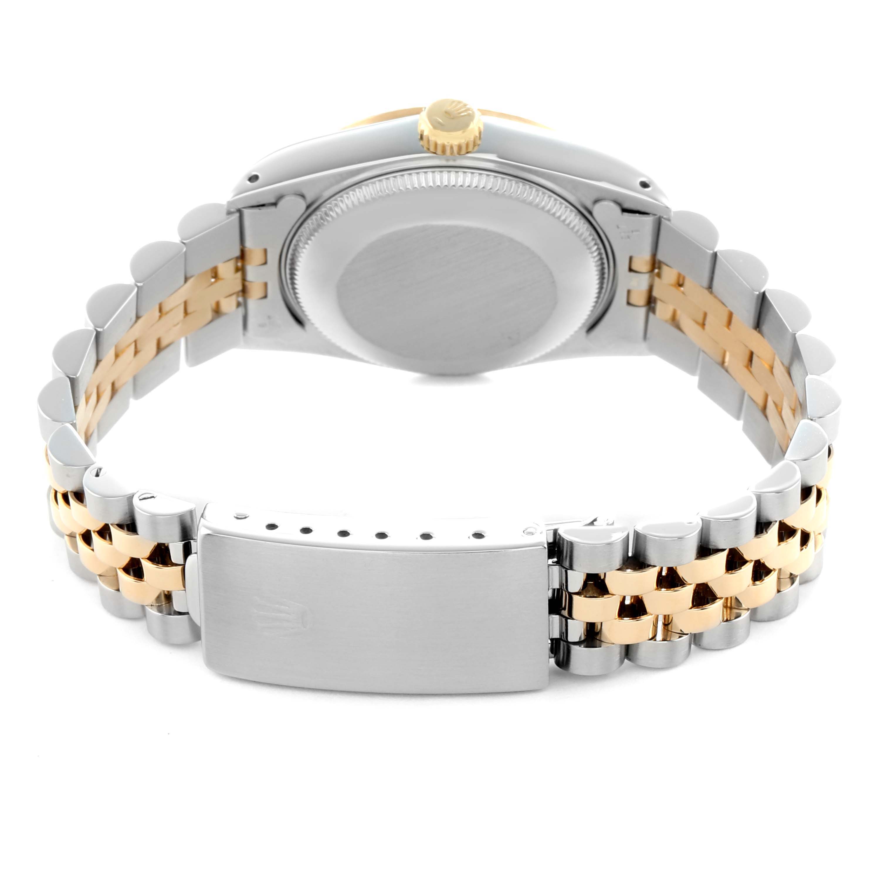 The Rolex Mid-Size 68273 Women's Steel and Gold (two tone) Champagne Dial watch is shown from the back, highlighting the clasp, bracelet, and crown.