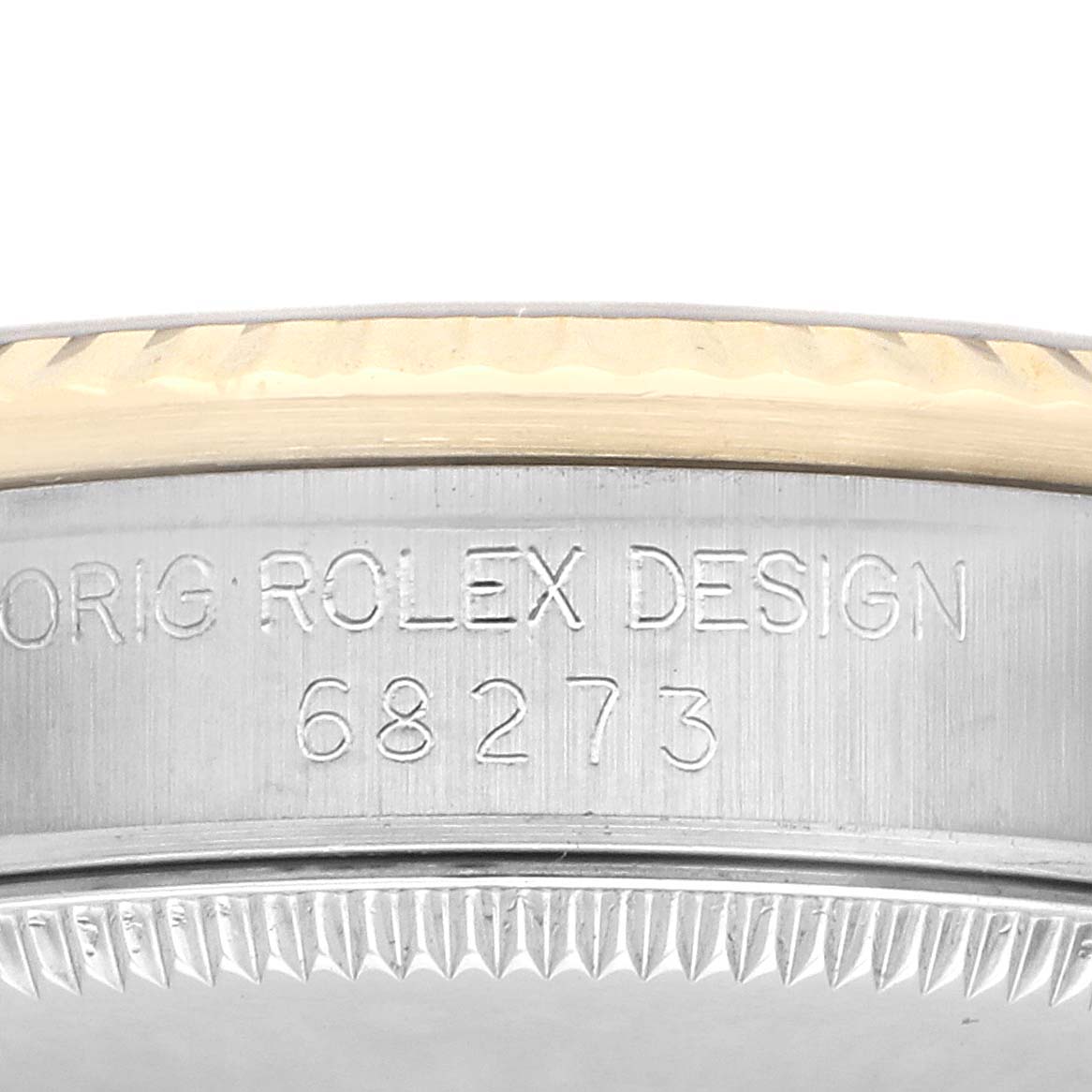 The image shows a close-up of the side of a mid-size Rolex watch, highlighting the engraving on the case.