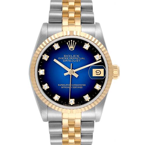 The Rolex Mid-Size Datejust is shown from the front, highlighting its two-toned bracelet, blue dial, and date feature.