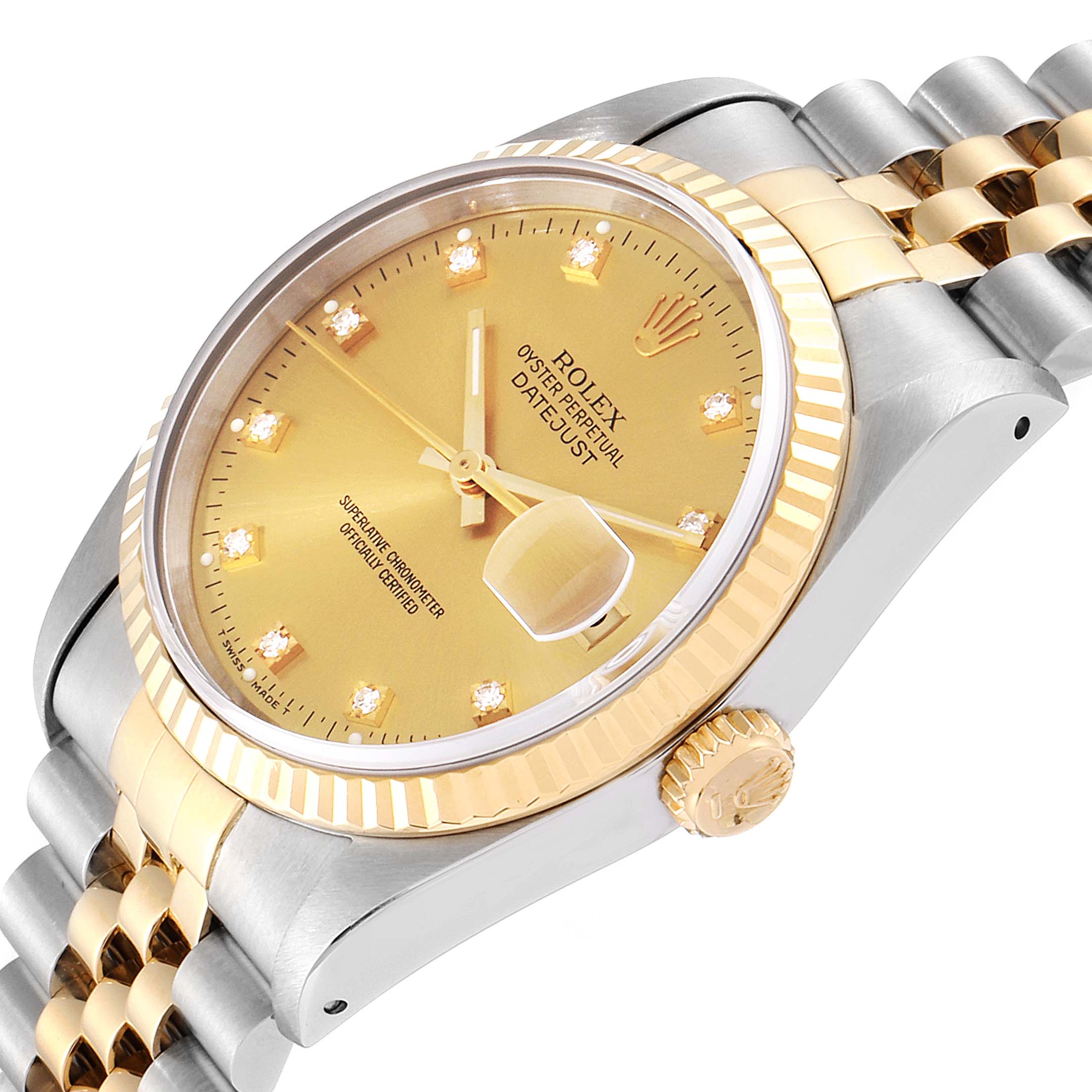 This image shows a side angle view of a Rolex Datejust 16233 Men
s Steel and Gold (two tone) Champagne Dial 16233 Men
s Steel and Gold (two tone) Champagne Dial watch, highlighting the gold dial, crown, and bi-metal bracelet.