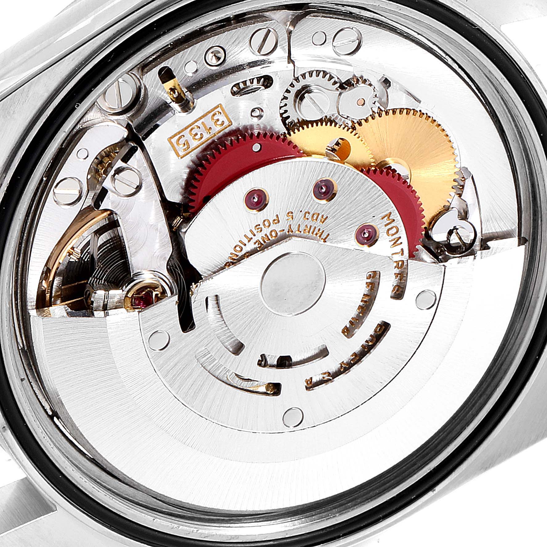 The image shows the inner mechanism of a Rolex Datejust 16233 Men
s Steel and Gold (two tone) Champagne Dial 16233 Men
s Steel and Gold (two tone) Champagne Dial model, highlighting its intricate gears and components from the back angle.