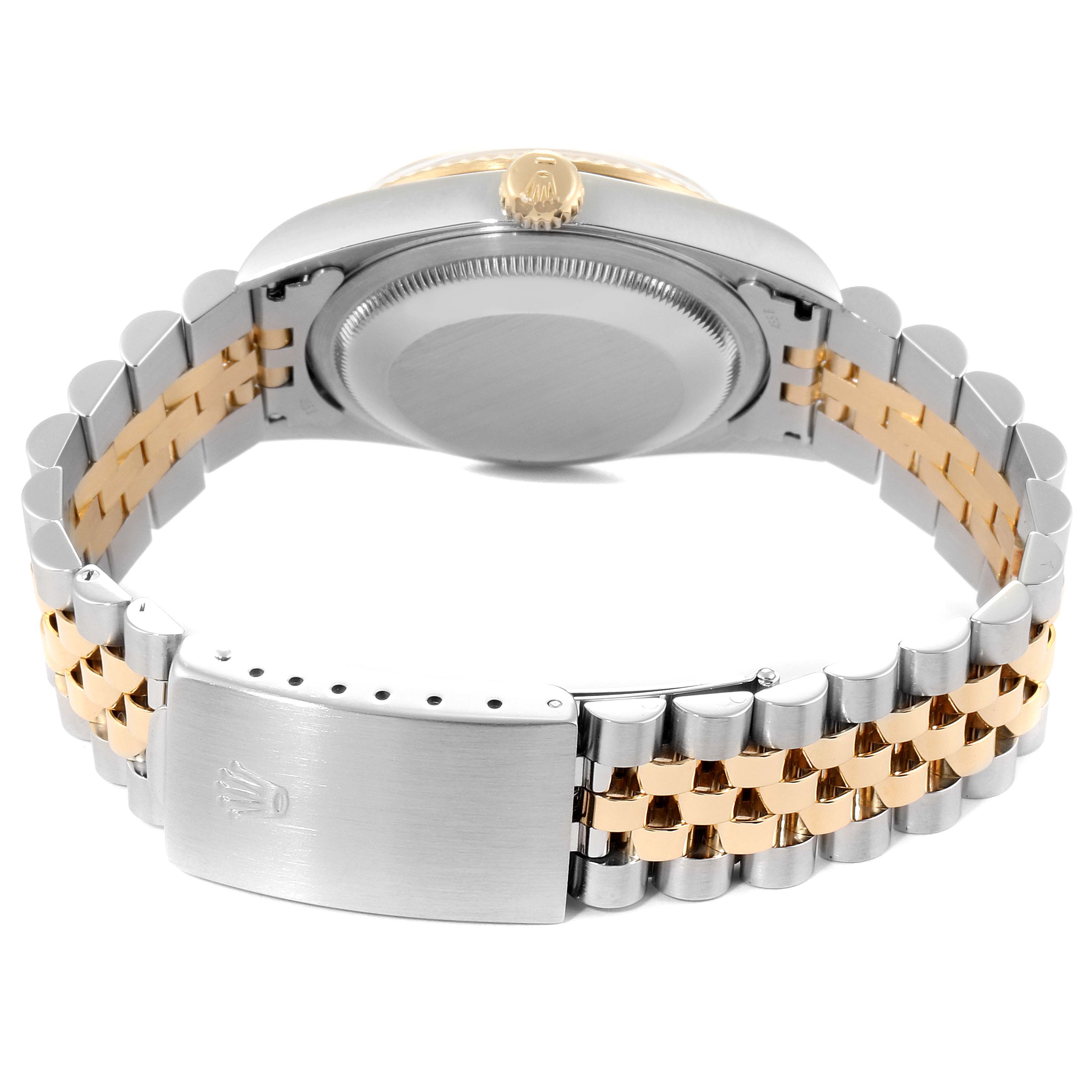 The image shows the back and clasp of a Rolex Datejust 16233 Men
s Steel and Gold (two tone) Champagne Dial 16233 Men
s Steel and Gold (two tone) Champagne Dial watch, highlighting the two-tone bracelet and case back.
