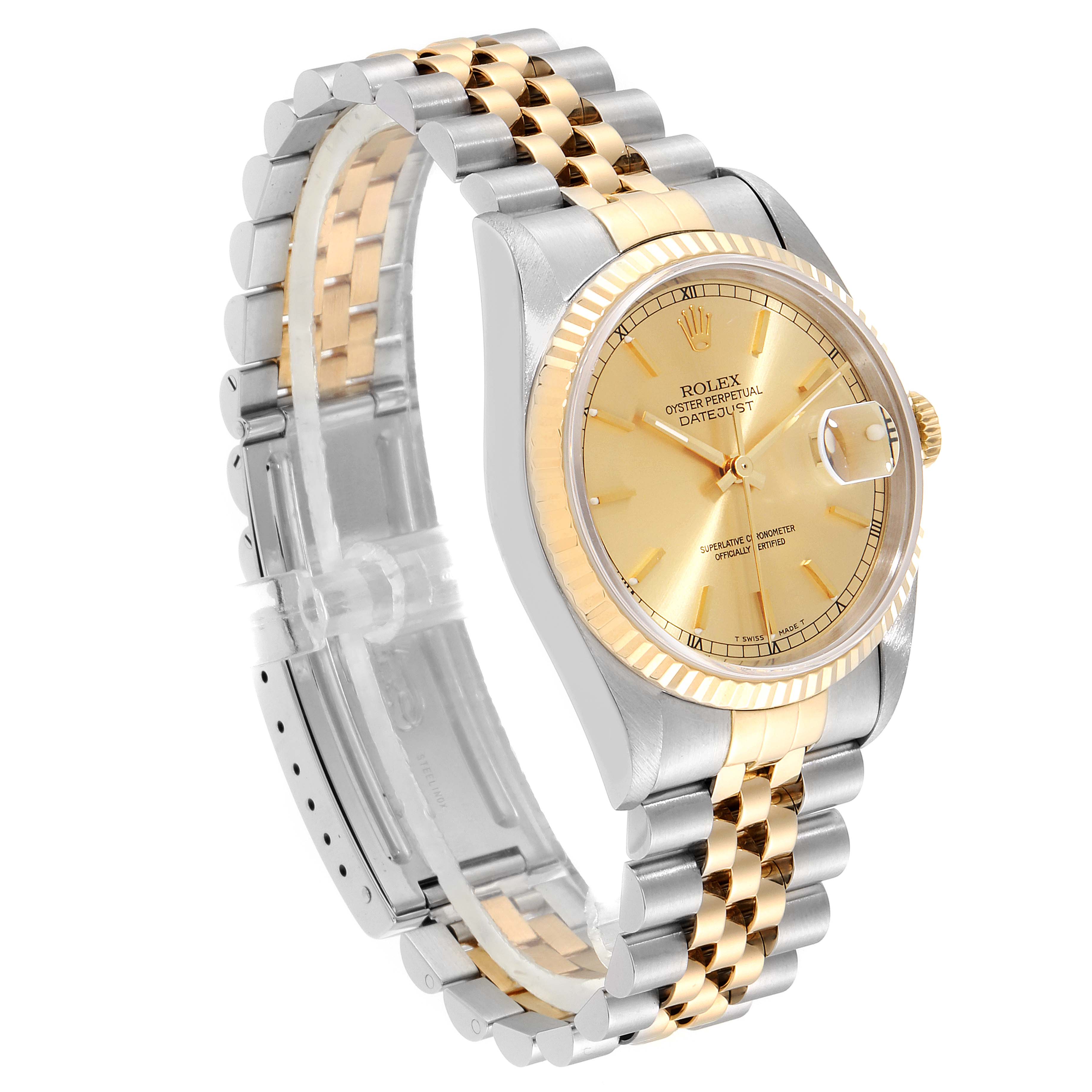 The watch is a Rolex Datejust 16233 Men
s Steel and Gold (two tone) Champagne Dial 16233 Men
s Steel and Gold (two tone) Champagne Dial, shown at an angle highlighting the gold dial, fluted bezel, and the two-tone bracelet.