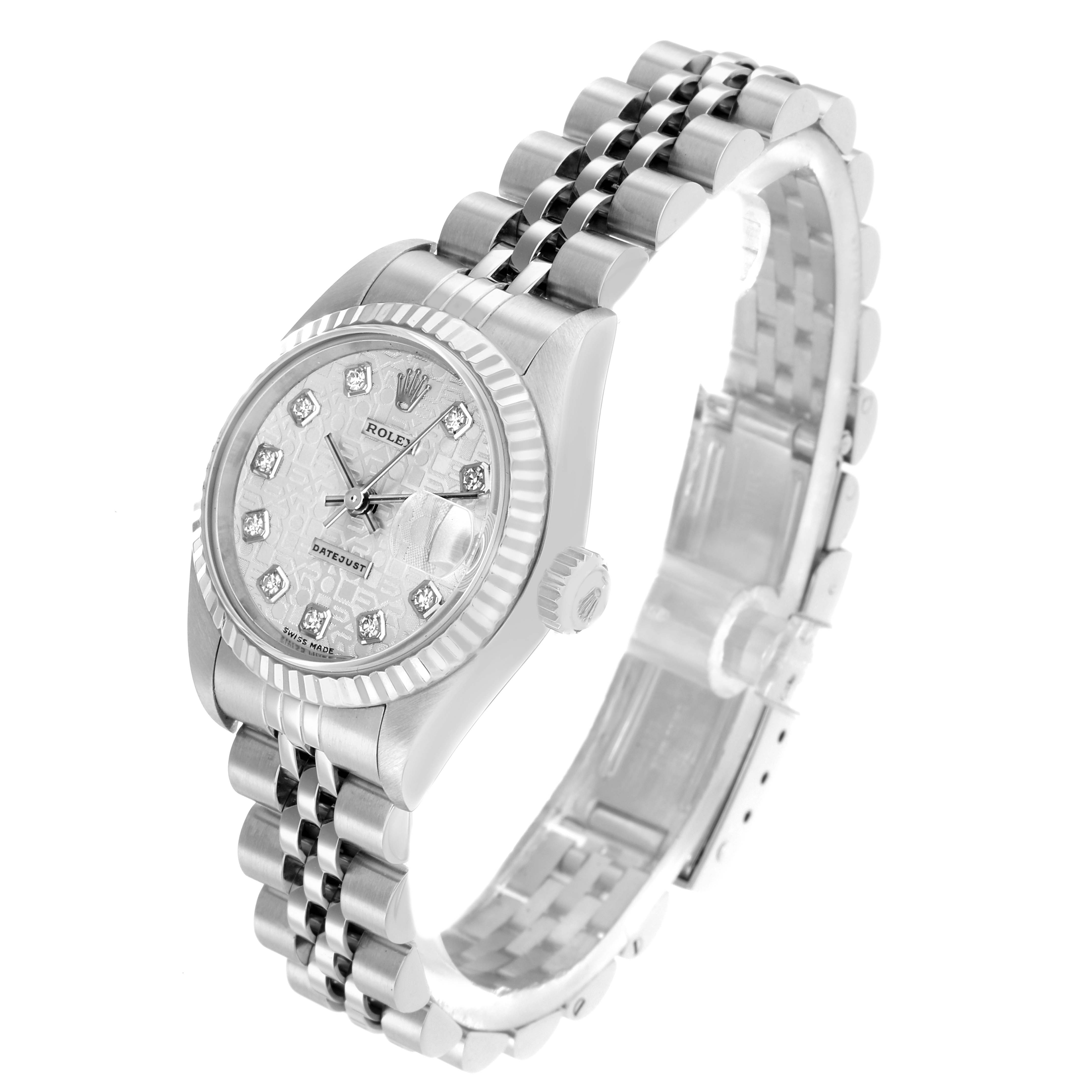 The Rolex Datejust 79174 Women's Stainless Steel Silver Dial watch is shown at an angled side view, displaying the face, dial, bezel, and part of the bracelet.