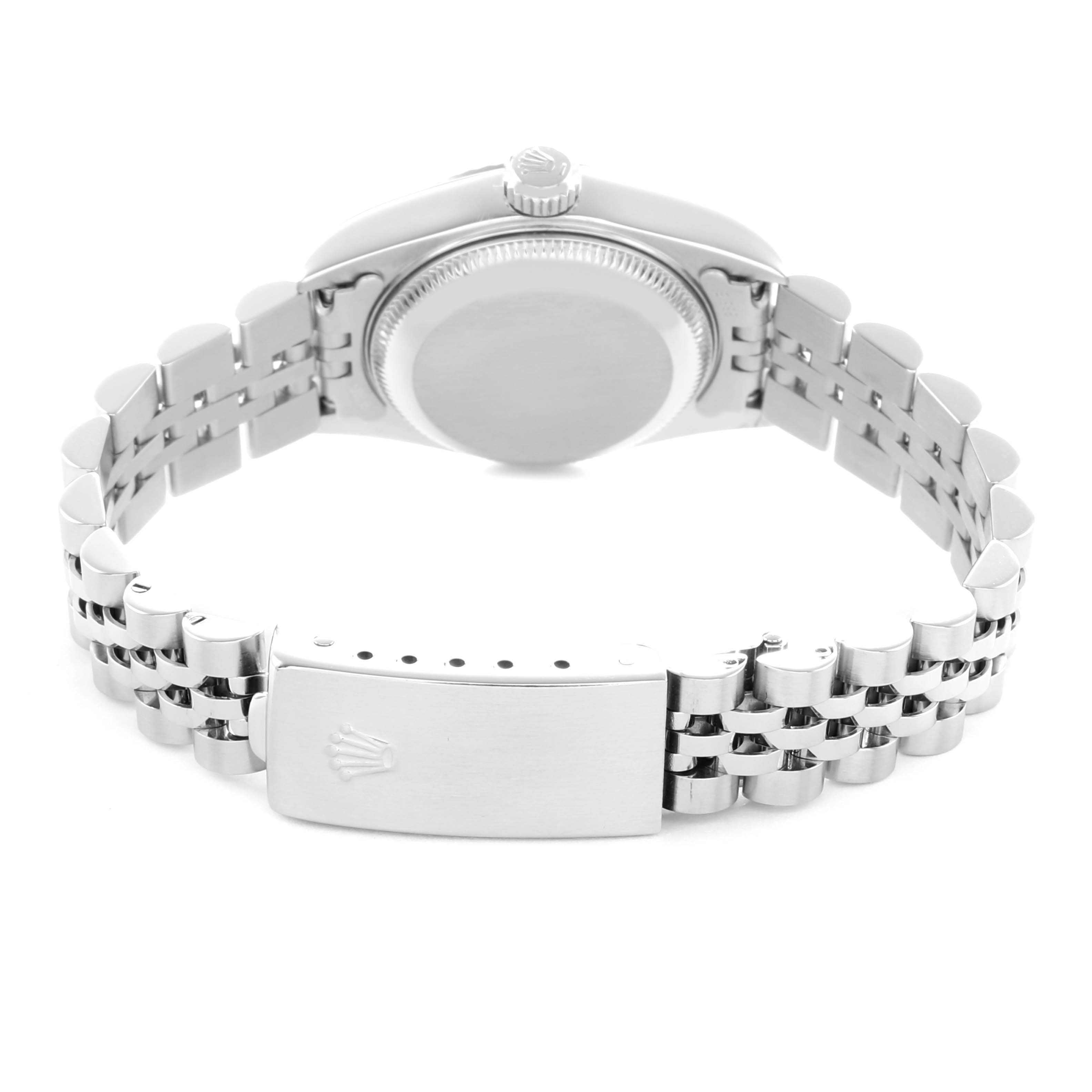 The image shows a Rolex Datejust 79174 Women's Stainless Steel Silver Dial from the back, highlighting the case back, crown, and Jubilee bracelet with clasp.