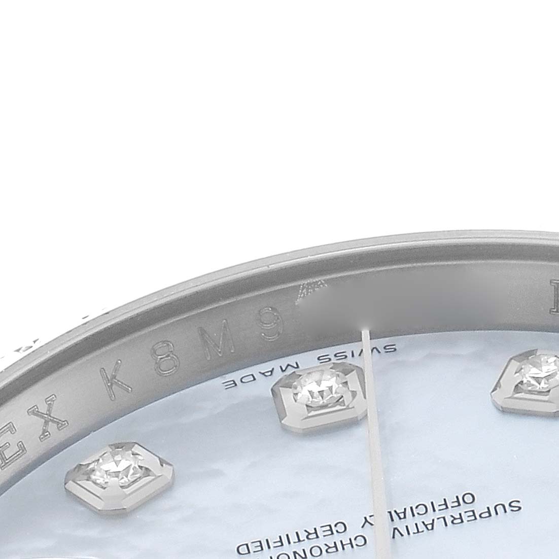 The image shows a close-up angle of the Rolex Datejust 116244 Men
s Stainless Steel Mother of Pearl Dial face with diamond markers and the inner bezel.