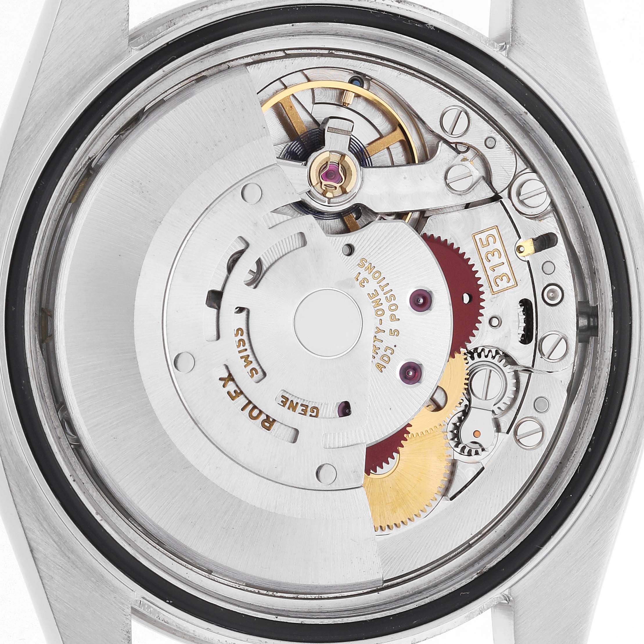 The image shows a close-up of the Rolex Datejust 116244 Men
s Stainless Steel Mother of Pearl Dial
s internal mechanism from the back, highlighting its gears and movement components.