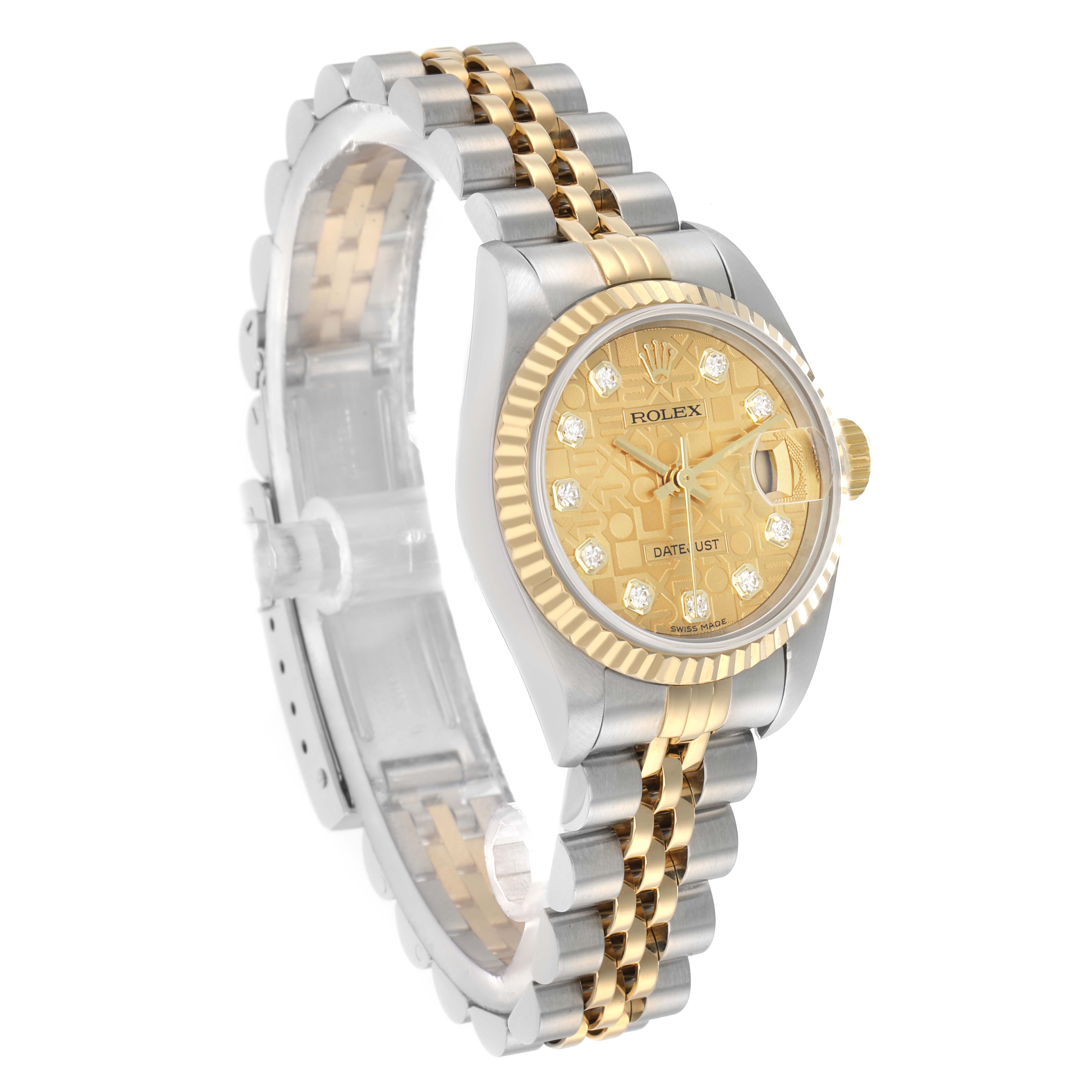 The Rolex Datejust 79173 Women's Steel and Gold (two tone) Champagne Dial watch is shown in a three-quarter view, highlighting its gold and silver bracelet and diamond-accented face.