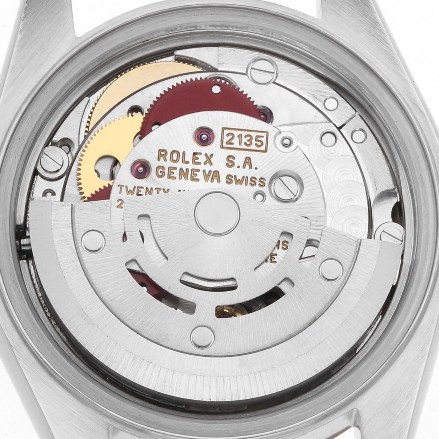 The image shows the movement mechanism of a Rolex Datejust 69173 Women
s Steel and Gold (two tone) Champagne Dial watch from the back.