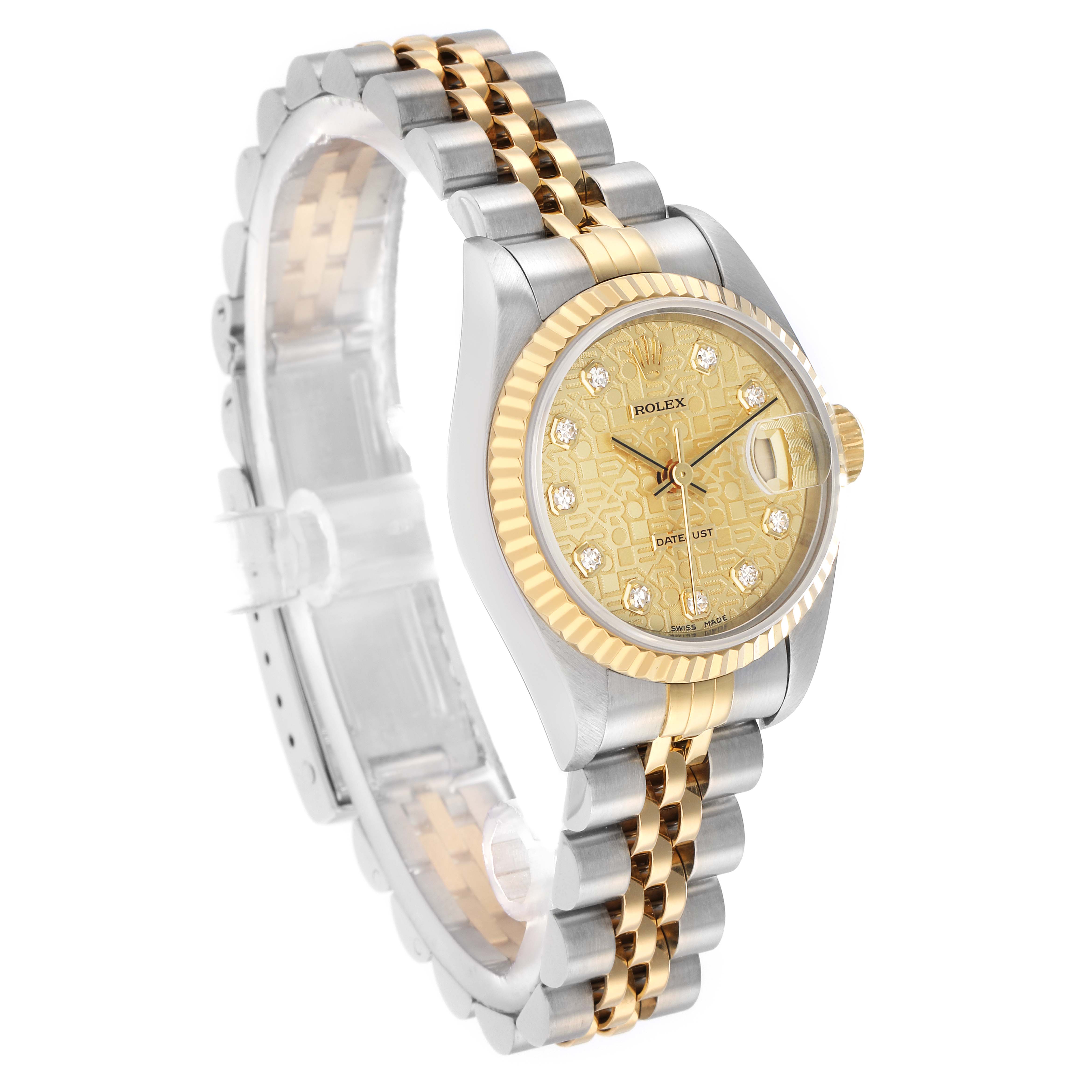 The Rolex Datejust 69173 Women
s Steel and Gold (two tone) Champagne Dial watch is shown at a three-quarter angle, displaying its patterned gold dial, diamond indices, and two-tone Jubilee bracelet.