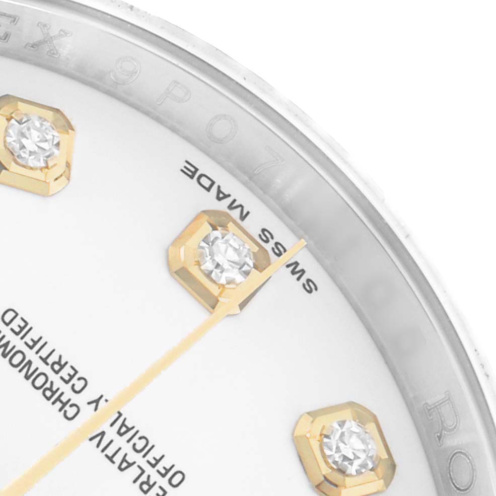 The image shows a close-up of the Rolex Datejust 116233 Men
s Steel and Gold (two tone) White Dial dial, highlighting diamond hour markers and partial hands.