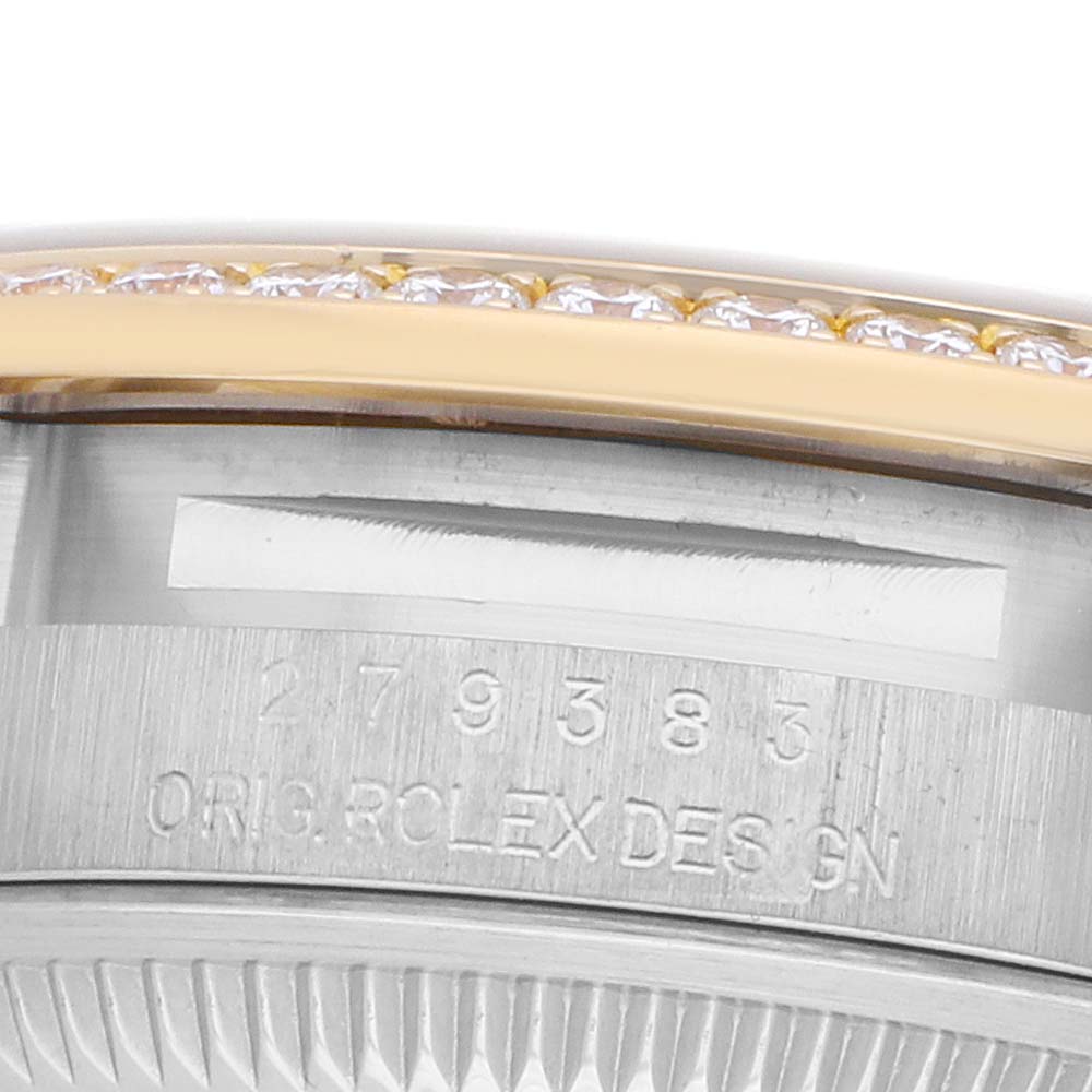 The image shows a close-up of the Rolex Datejust 279383 Women's Steel and Gold (two tone) Champagne Dial's side, featuring the bezel with diamond detailing and part of the case's engravings.