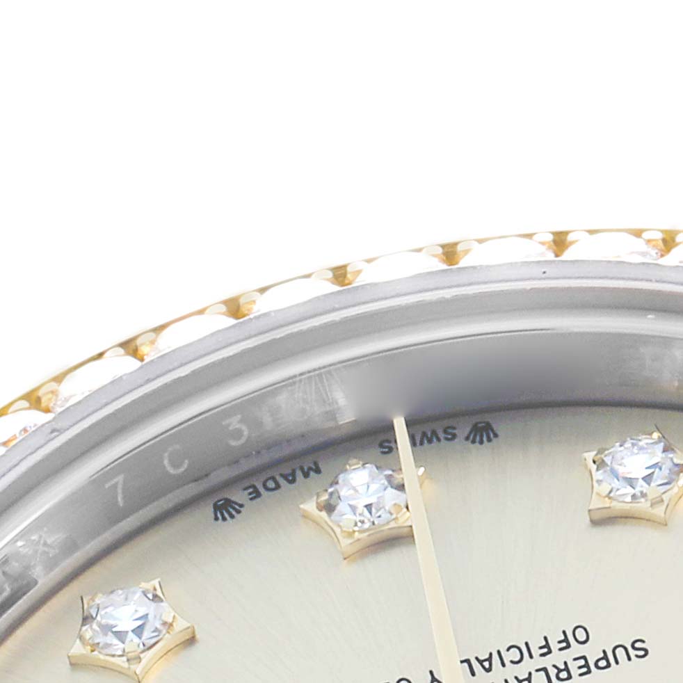 The image shows a close-up of the Rolex Datejust 279383 Women's Steel and Gold (two tone) Champagne Dial, focusing on the bezel, part of the dial, and diamond hour markers.
