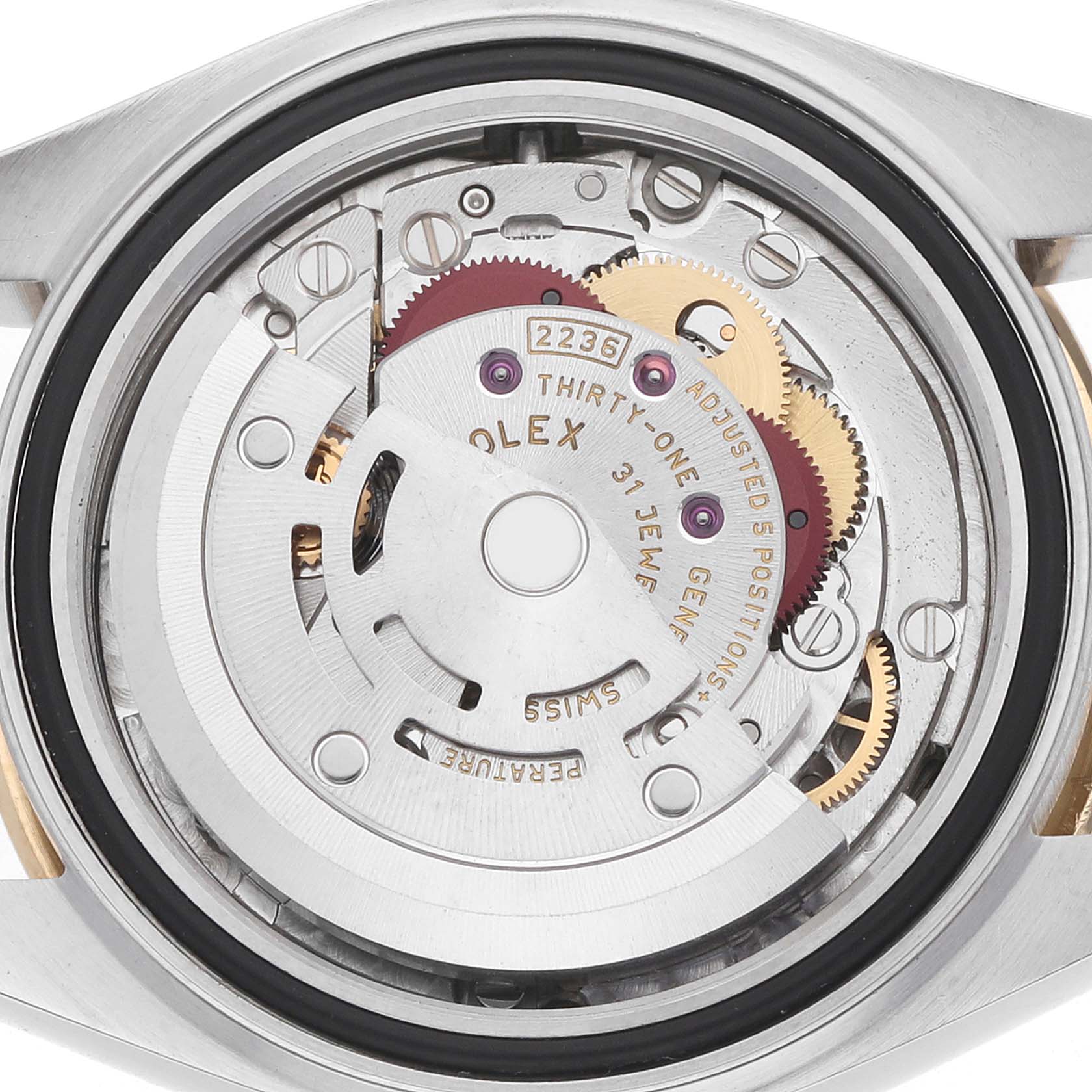 The image shows the movement of a Rolex Datejust 279383 Women's Steel and Gold (two tone) Champagne Dial watch from the back, displaying gears and internal components.