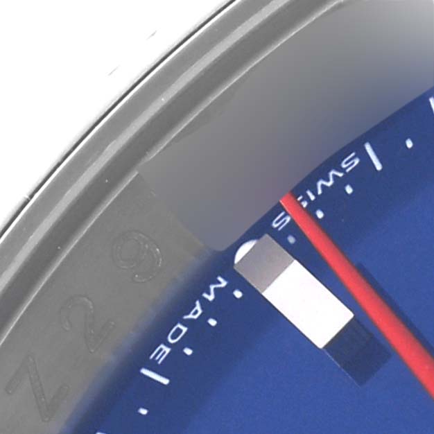 The image shows a close-up of the bezel and part of the dial of a Rolex Turn-o-Graph 116264 Men
s Stainless Steel Blue Dial 116264 Men
s Stainless Steel Blue Dial watch.