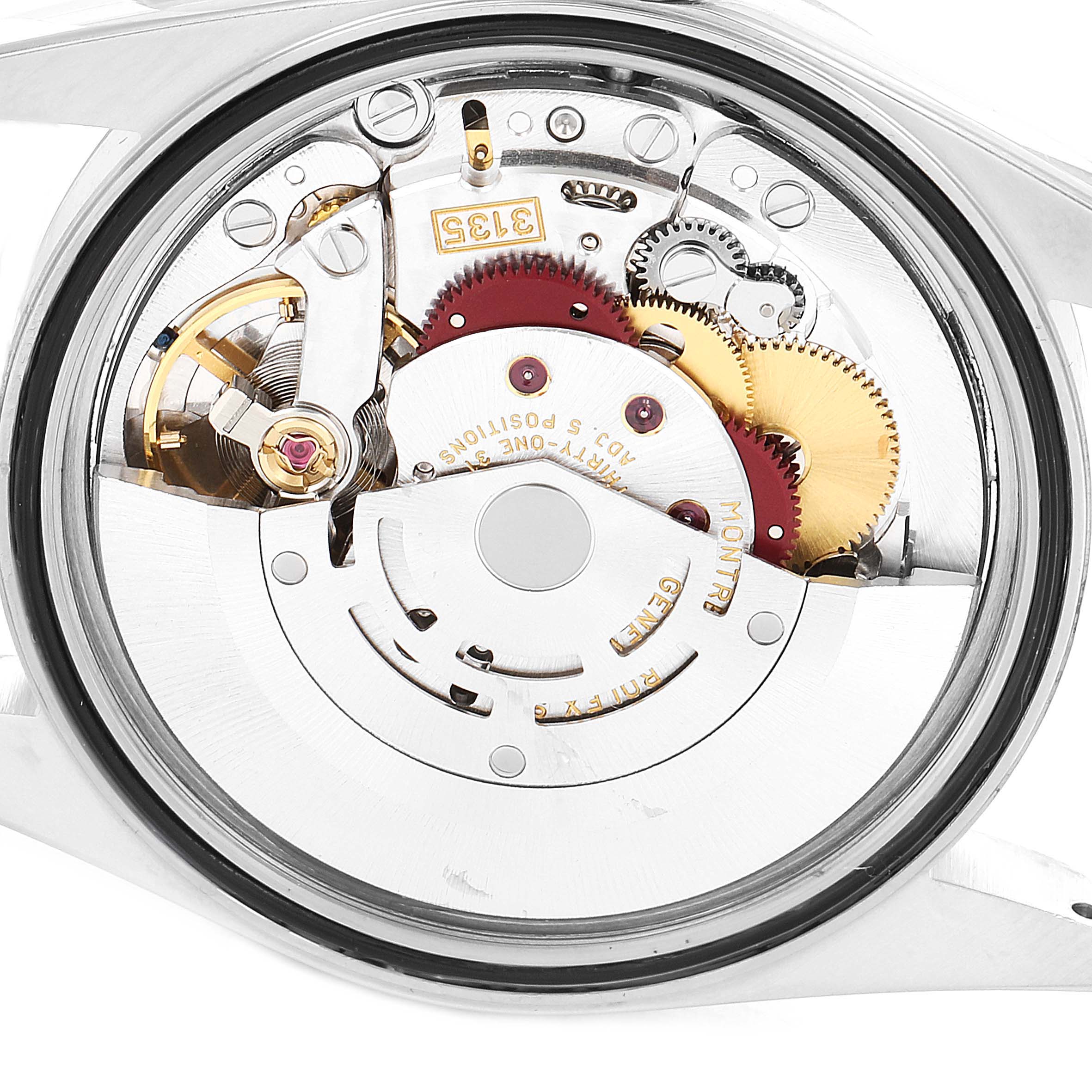 The image shows a close-up view of the movement mechanism inside a Rolex Datejust 16200 Men's Stainless Steel White Dial 16200 Men's Stainless Steel White Dial watch, revealing intricate gears and components.