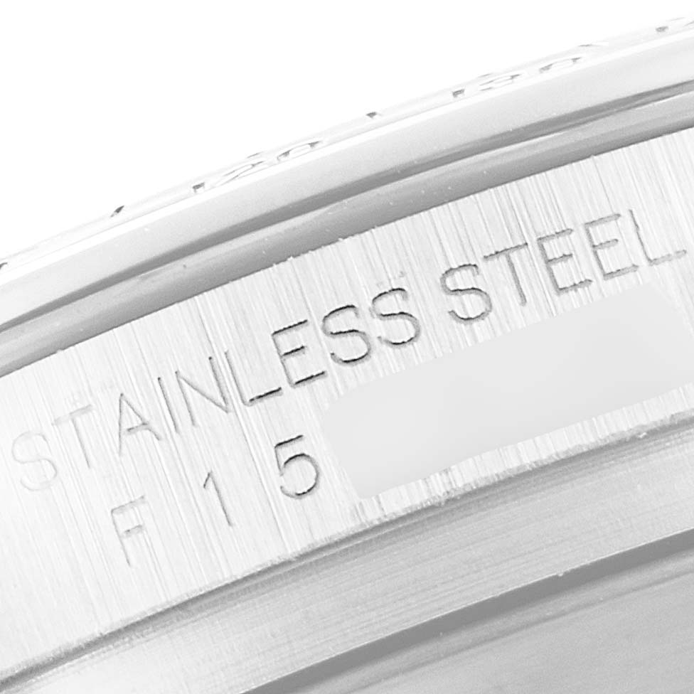 This image shows a close-up angle of the Rolex Daytona 116520 Men's Stainless Steel White Dial 116520 Men's Stainless Steel White Dial watch's stainless steel caseback, highlighting the engraved details.