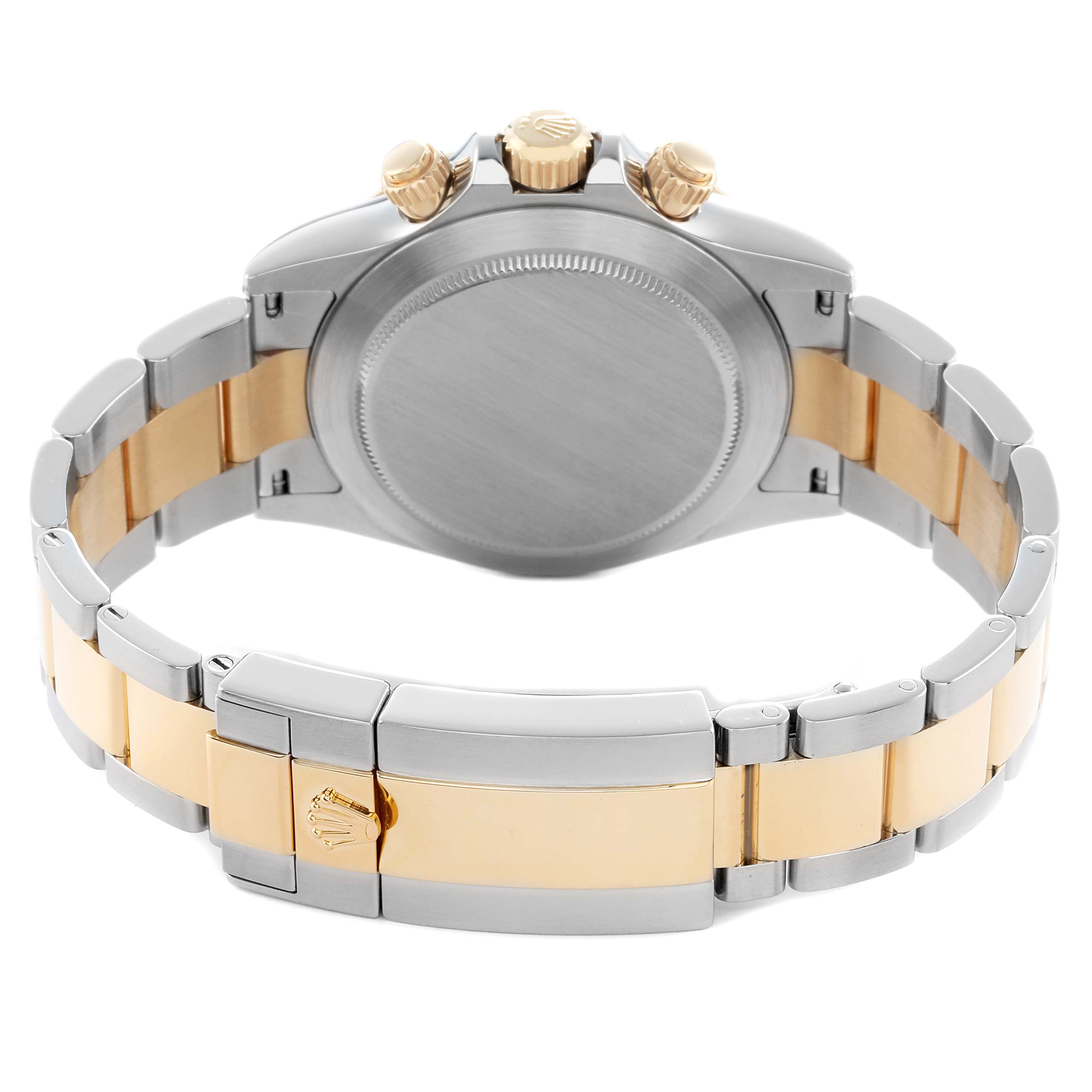 The image shows the back and strap of a Rolex Daytona 116523 Men
s Steel and Gold (two tone) Black Dial watch, highlighting the clasp and crown.