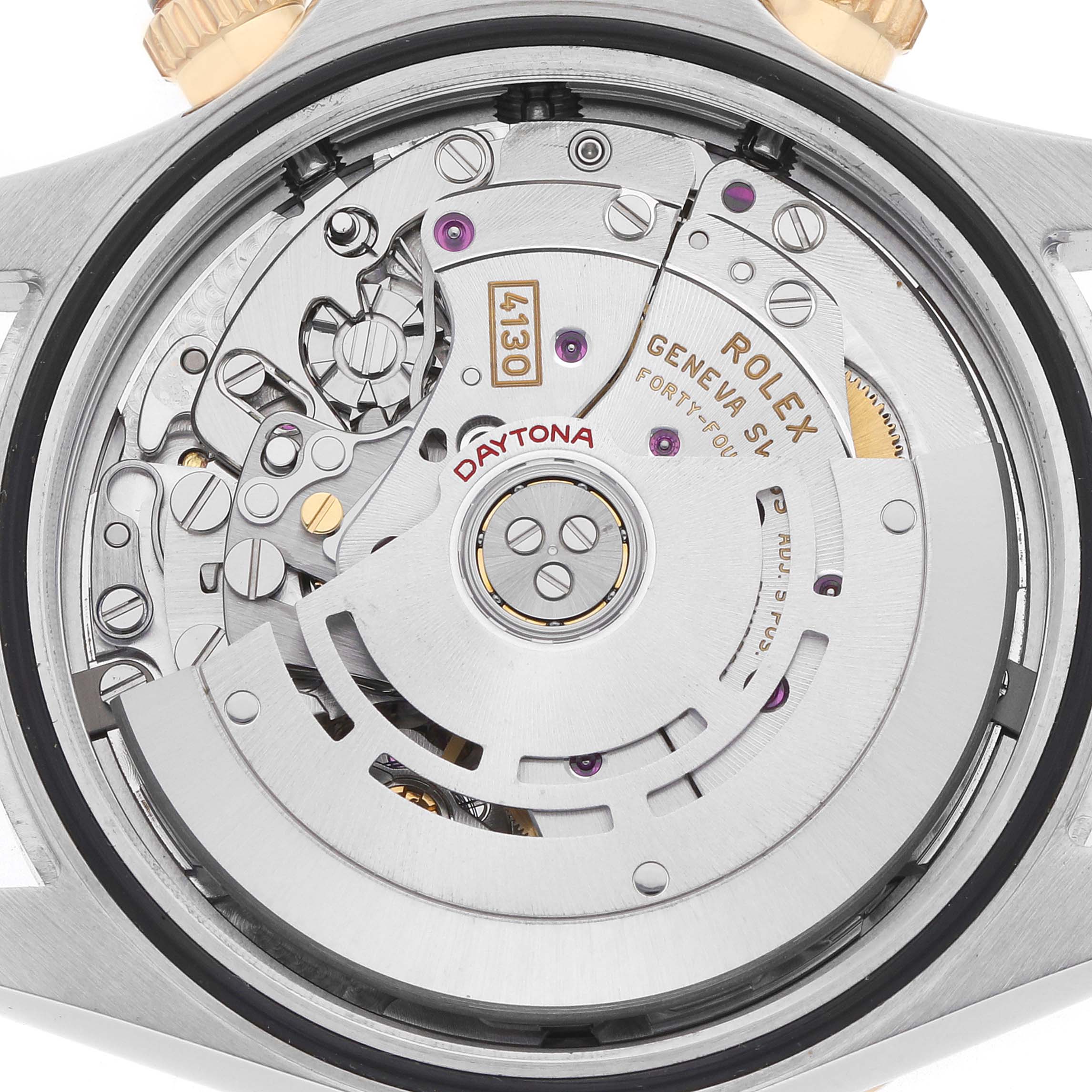 The image shows the movement of a Rolex Daytona 116503 Men
s Steel and Gold (two tone) Champagne Dial watch from a rear angle, displaying its intricate internal components.