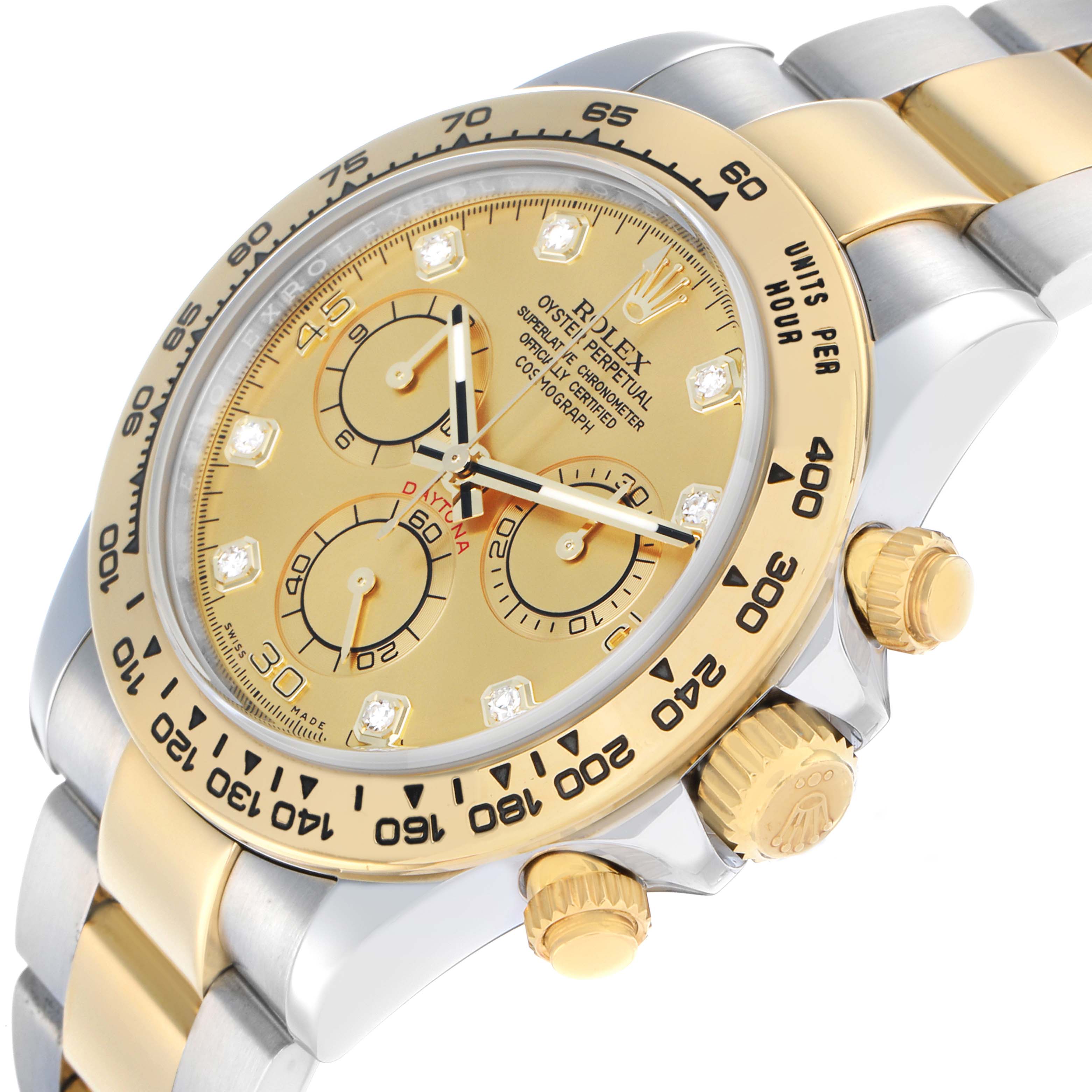 The Rolex Daytona 116503 Men
s Steel and Gold (two tone) Champagne Dial is shown at a slightly tilted angle, highlighting the dial, bezel, crown, and pushers.