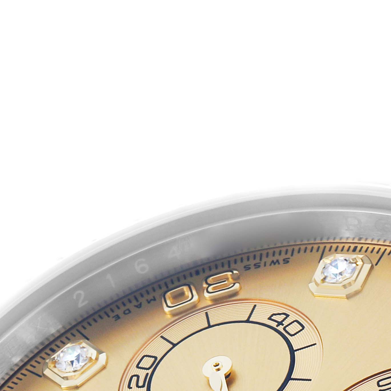 The image shows a close-up of the Rolex Daytona 116503 Men
s Steel and Gold (two tone) Champagne Dial
s dial, featuring part of the bezel, subdials, and diamond hour markers.