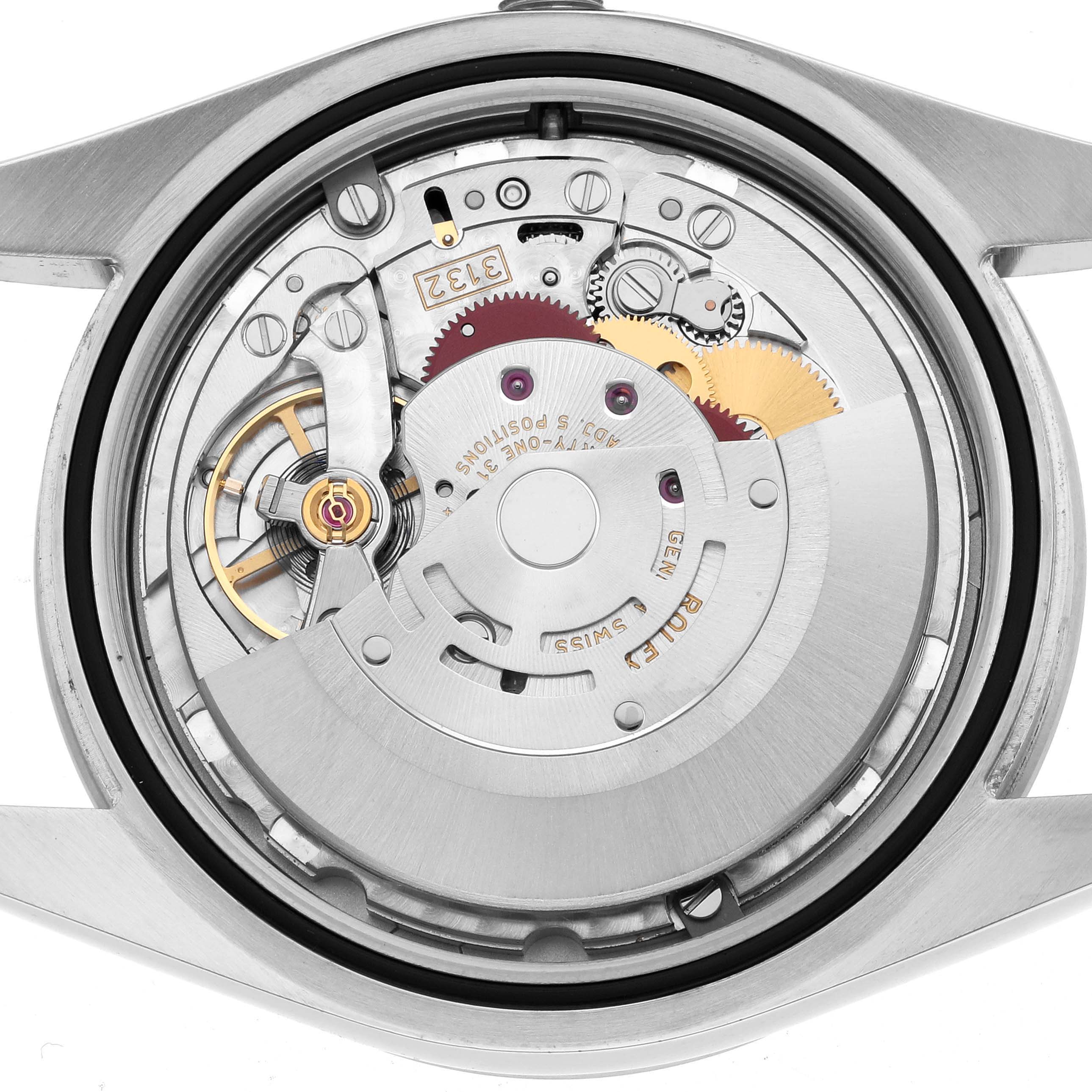 The image shows the Rolex Explorer 214270 Men
s Stainless Steel Black Dial
s movement from a top-down angle, highlighting gears and the automatic rotor.