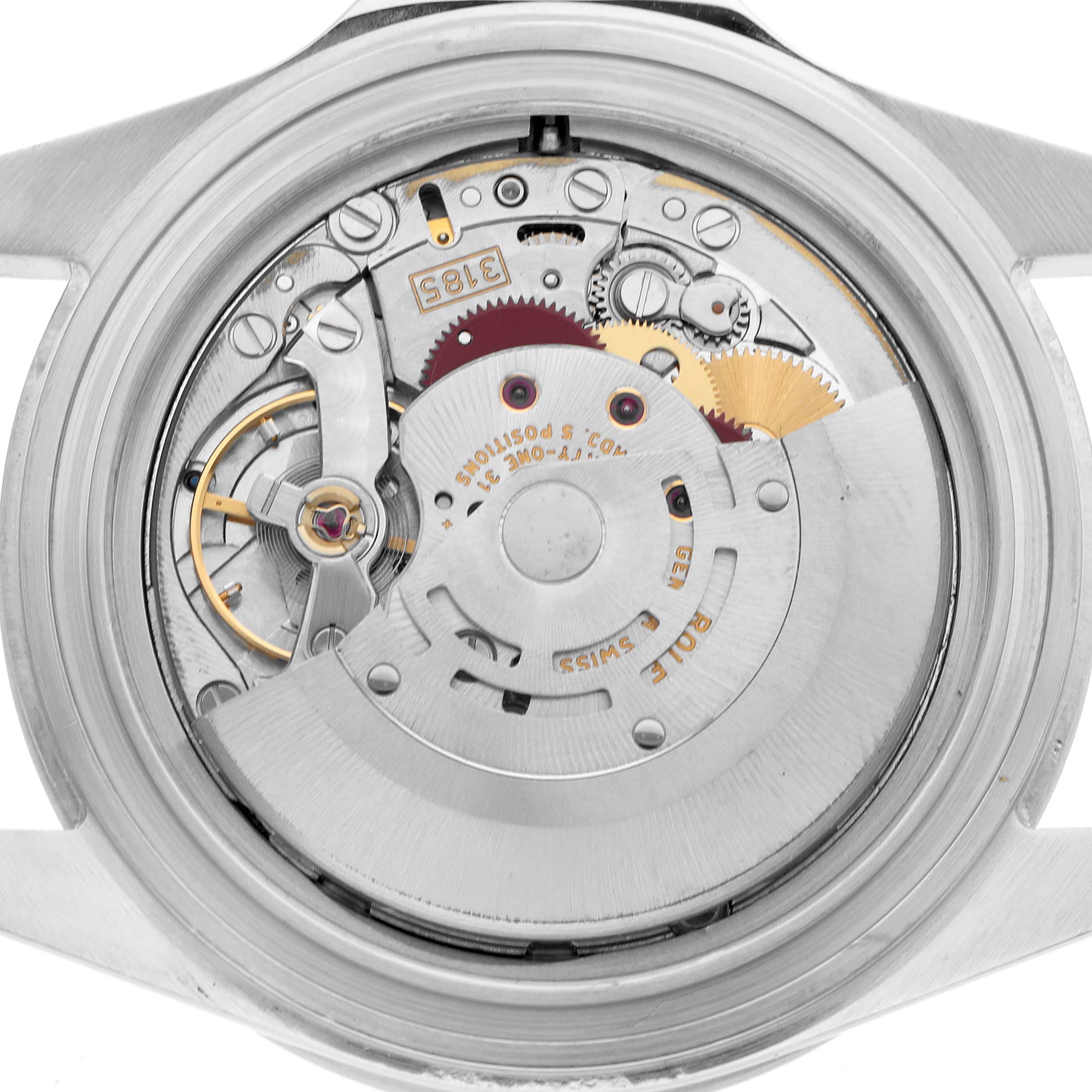 This image shows the internal mechanism of a Rolex Explorer 16570 Men
s Stainless Steel White Dial watch from a back angle, highlighting gears and intricate components.