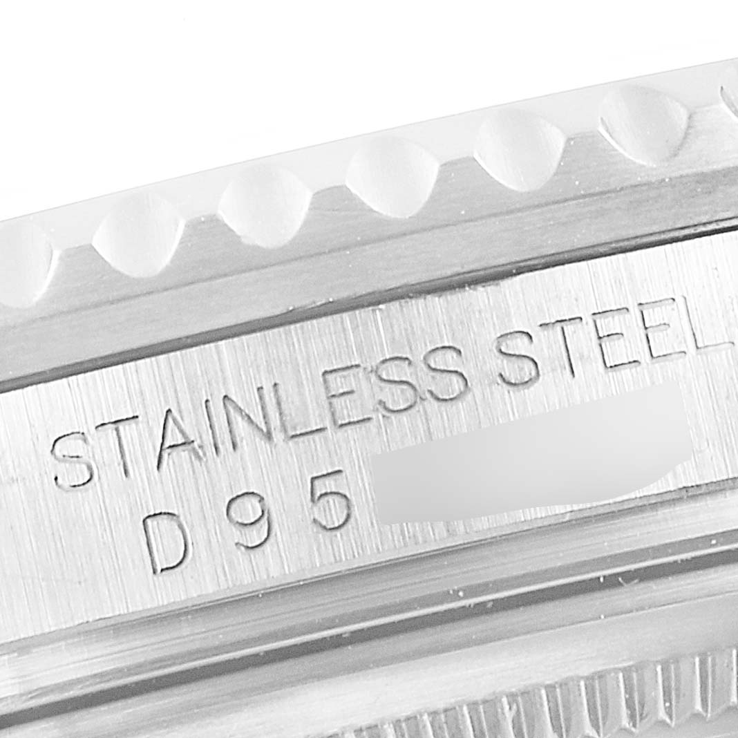 The image shows a close-up of the side engraving on the stainless steel case of a Rolex GMT-Master 16710 Men's Stainless Steel Black Dial 16710 Men's Stainless Steel Black Dial.