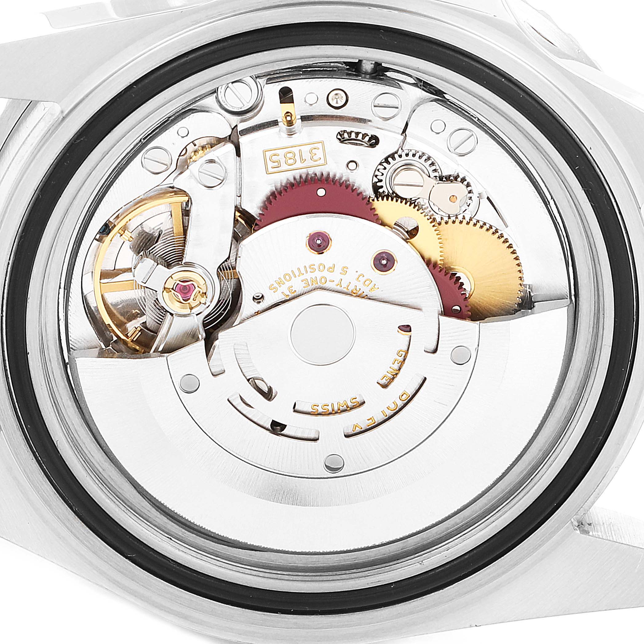 This is an internal view of a Rolex GMT-Master 16710 Men's Stainless Steel Black Dial 16710 Men's Stainless Steel Black Dial watch, showing its mechanical movement parts.