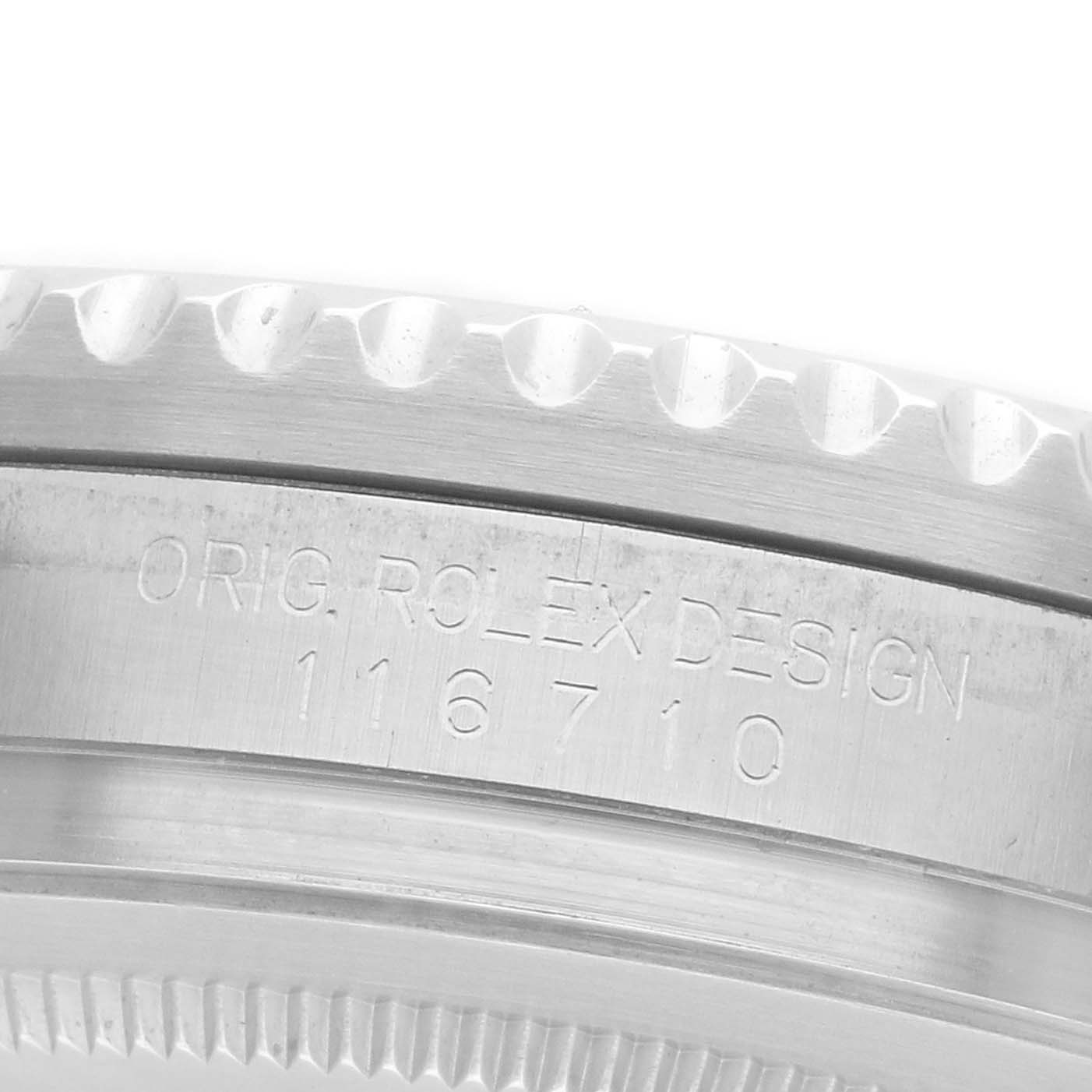 The image shows a close-up of the side of a Rolex GMT-Master 116710BLNR Men's Stainless Steel Black Dial, displaying the model number and bezel edge.