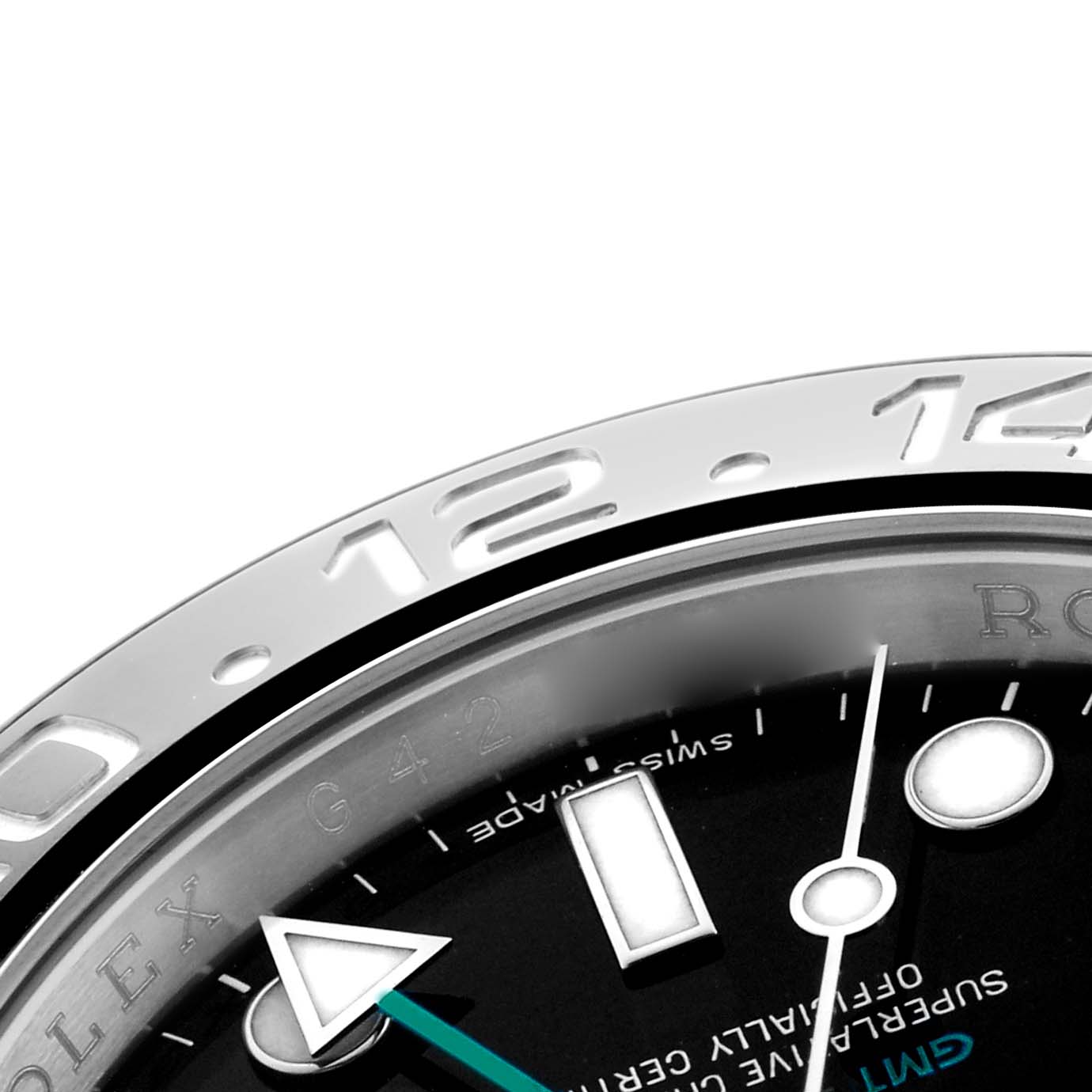 The image shows a close-up of the Rolex GMT-Master 116710 Men's Stainless Steel Black Dial's bezel and part of the dial, highlighting the indices and hands.