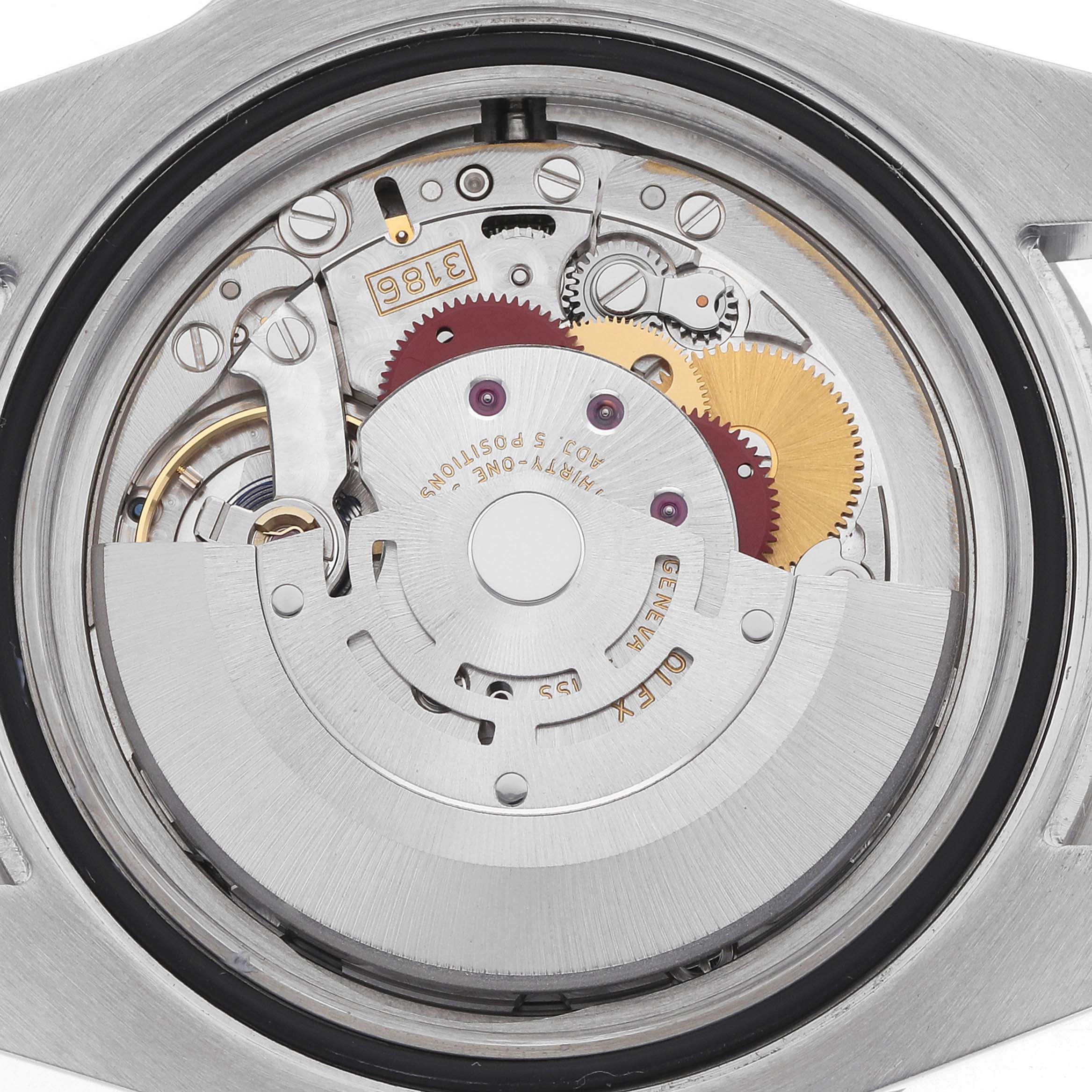 The image shows the internal mechanism of a Rolex GMT-Master 116710 Men's Stainless Steel Black Dial, highlighting its gears and movement parts from a top view.