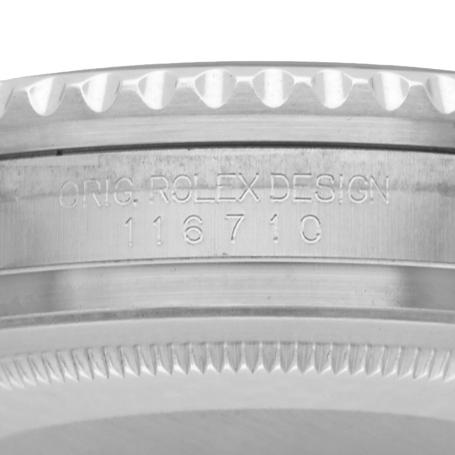 This close-up image shows the side profile of a Rolex GMT-Master 116710 Men
s Stainless Steel Black Dial model, highlighting the engraved model number and ridged bezel.